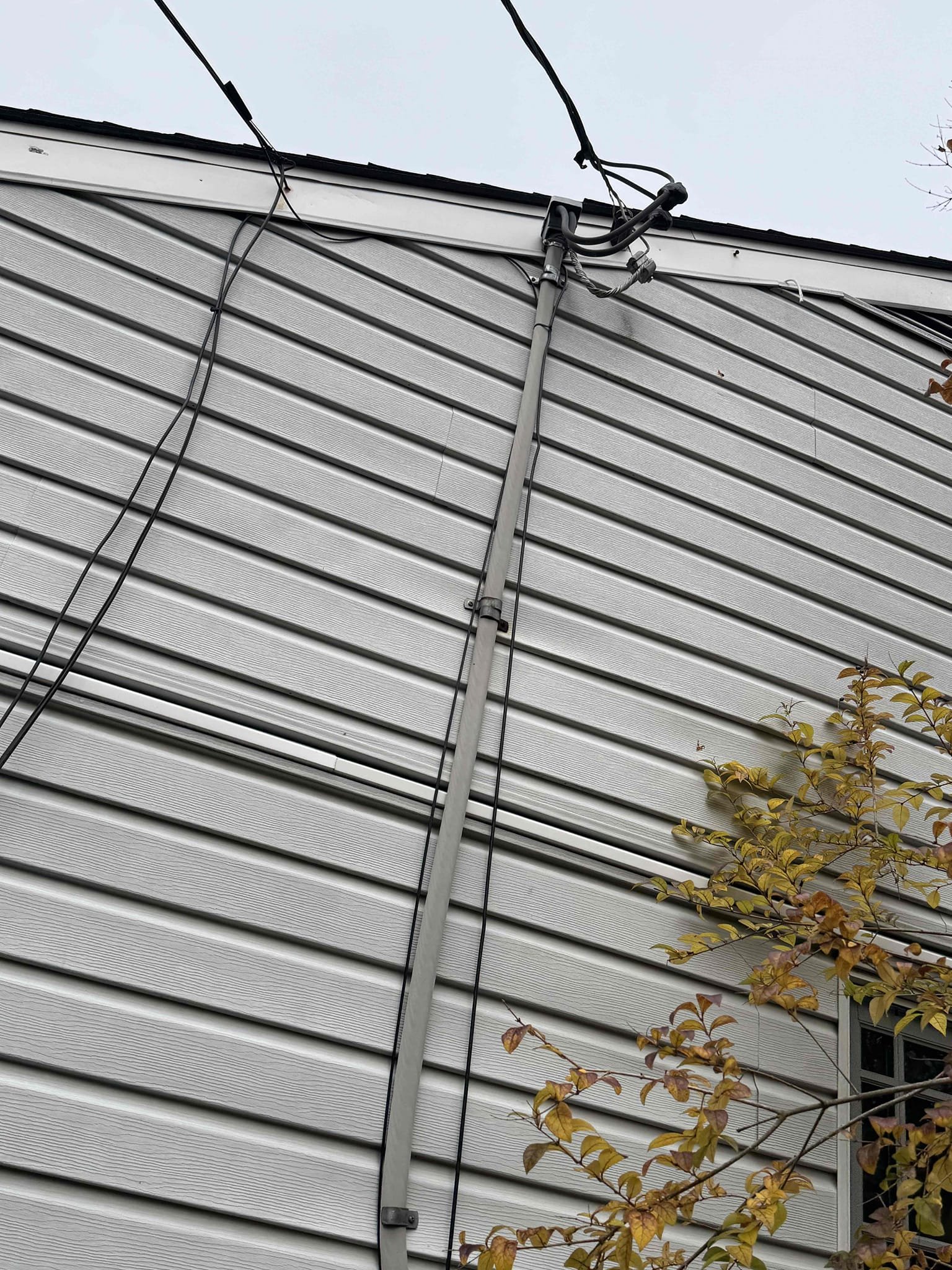 Install Surge protector inside main panel by tapping to main lugs and securing device within the load center