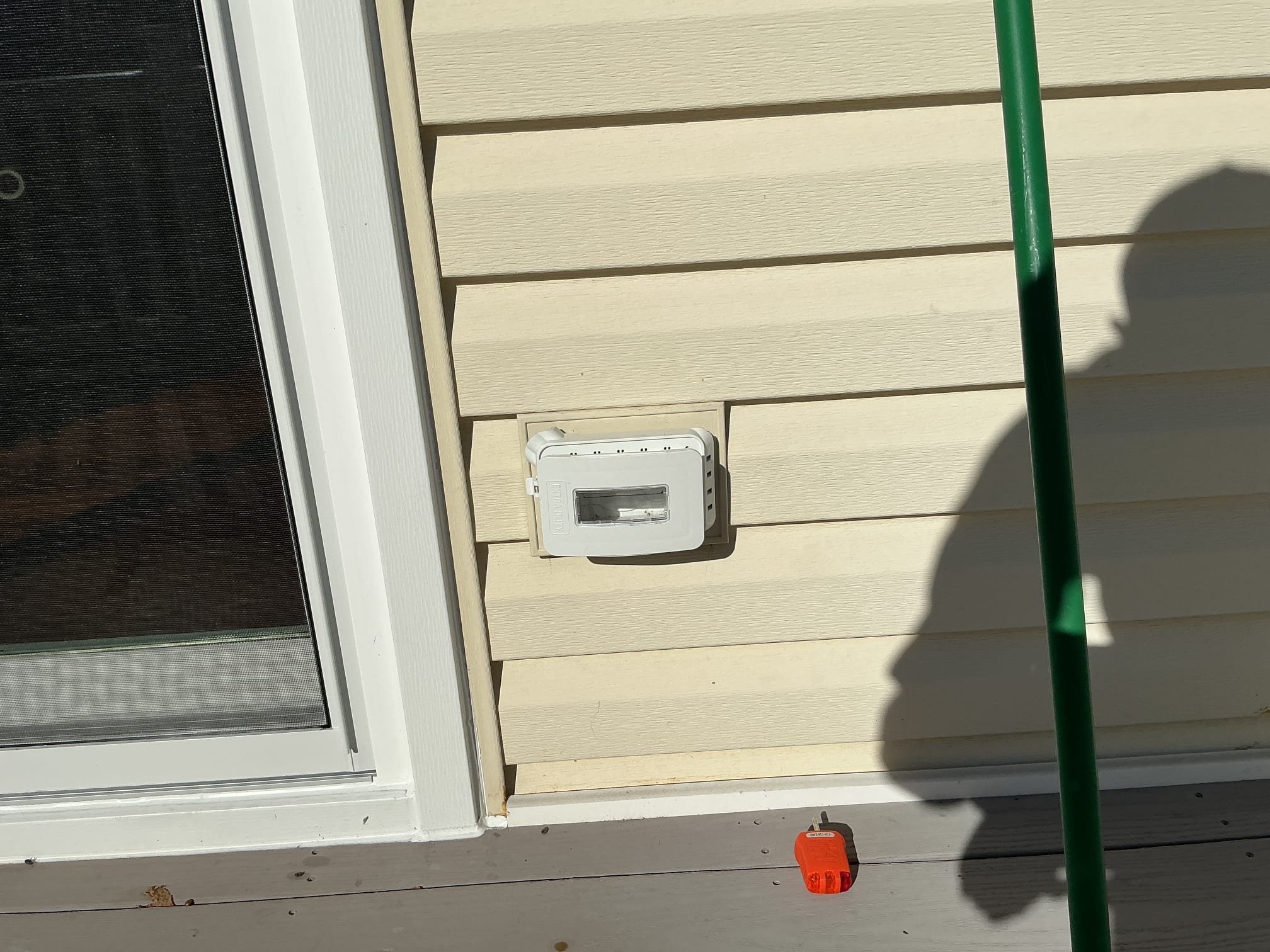 This solution includes the replacement of the damaged exterior gfci. 

We have replaced the existing damaged gfci receptacle on rear exterior of home. Additionally we have installed surge protection at main panel.