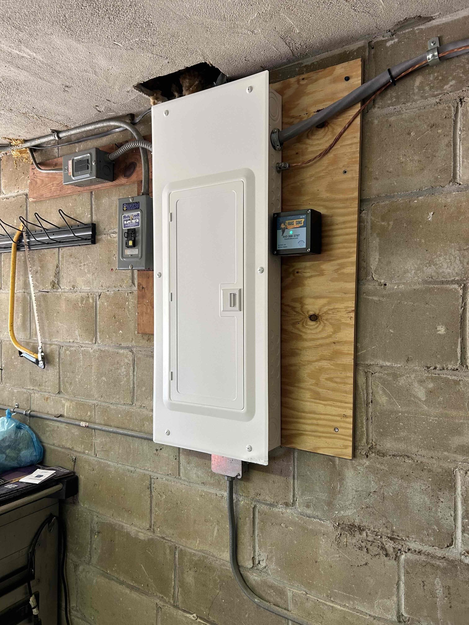 replace main panel in the back garage
Install new 200 amp main breaker service with all new code updates.
Installation of emergency disconnect on outside of the home.
Installation of whole home surge protection in the main panel.
Installation of new grounding system.
We will pull an electrical permit.
We will run a new 100 amp line to the basement sub panel .