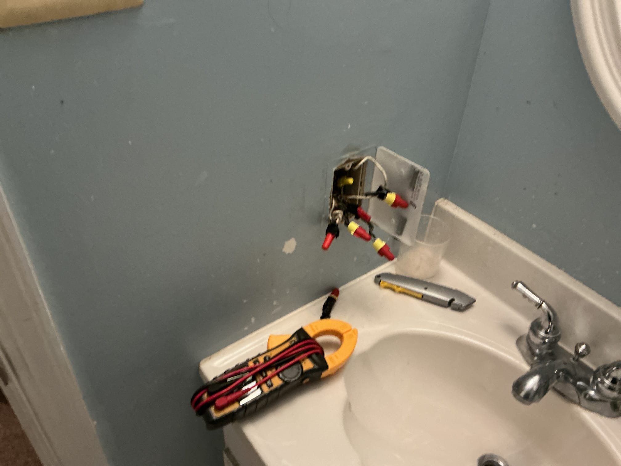 This solution includes the installation of a 120V 20A circuit for the sauna. Additionally we shall make wiring repairs to the garage and install new gfci receptacles in garage and replacing the existing fixtures with new customer supplied exterior lights, 2 total. Lastly we shall restore power to the bathrooms. This solution also includes basic required surge protection at main panel.

We have installed the sauna circuit, installed new gfci receptacles in garage, installed new gfci in basement bathroom, repaired the open ground in garage, installed surge protector and have begun to replace the garage lights. We shall return to replace the one remaining fixture, ensuring we return with the bronze bell box. We always recommend using a dedicated circuit for EV charging. Paid in full.

We have installed the exterior fixture at garage.