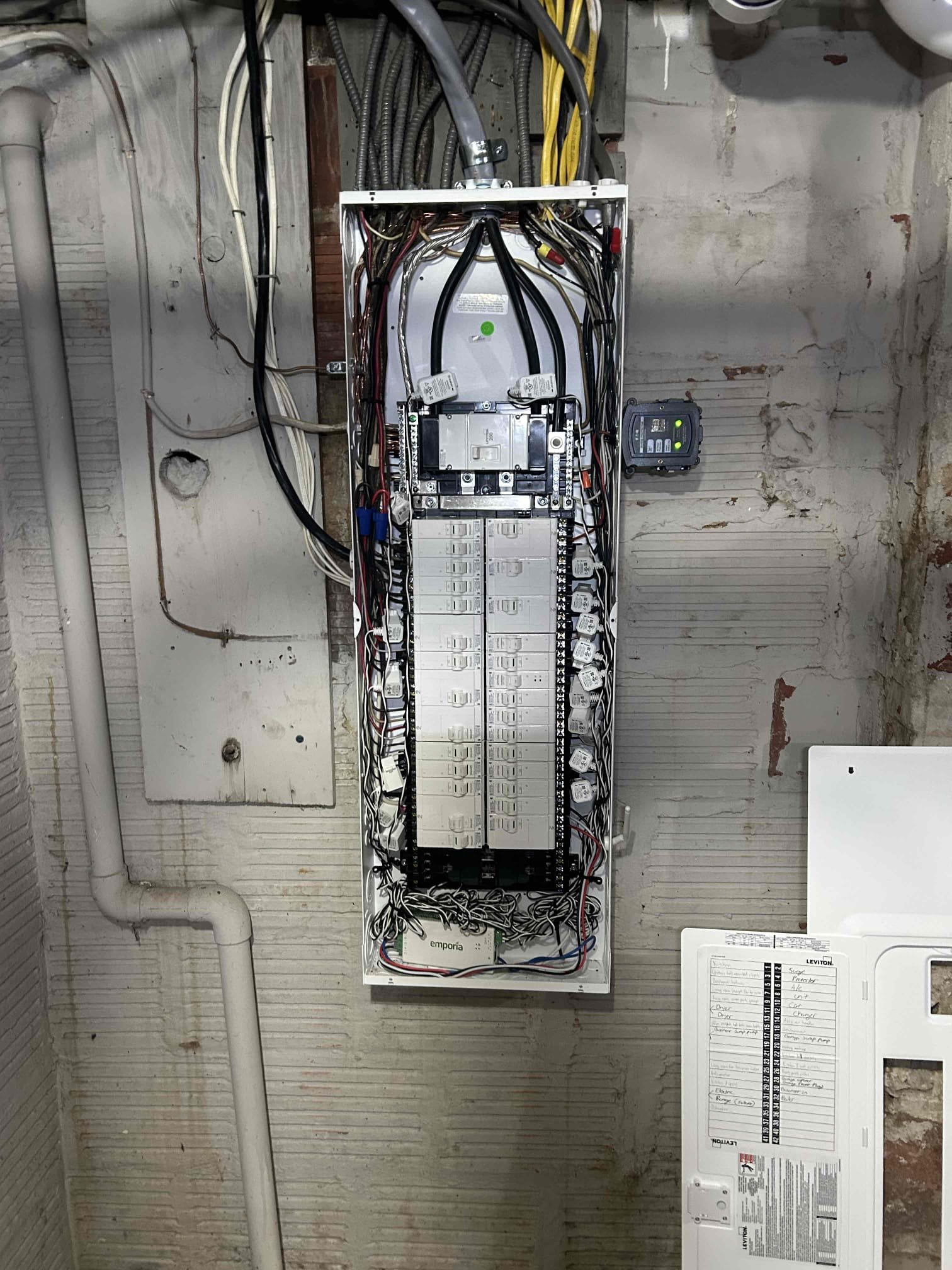 Installation of customer supplied Emporia monitoring system inside the main panel with a new two pole breaker of power system.
Well, on site, we also replaced the customer supplied light in the laundry room.