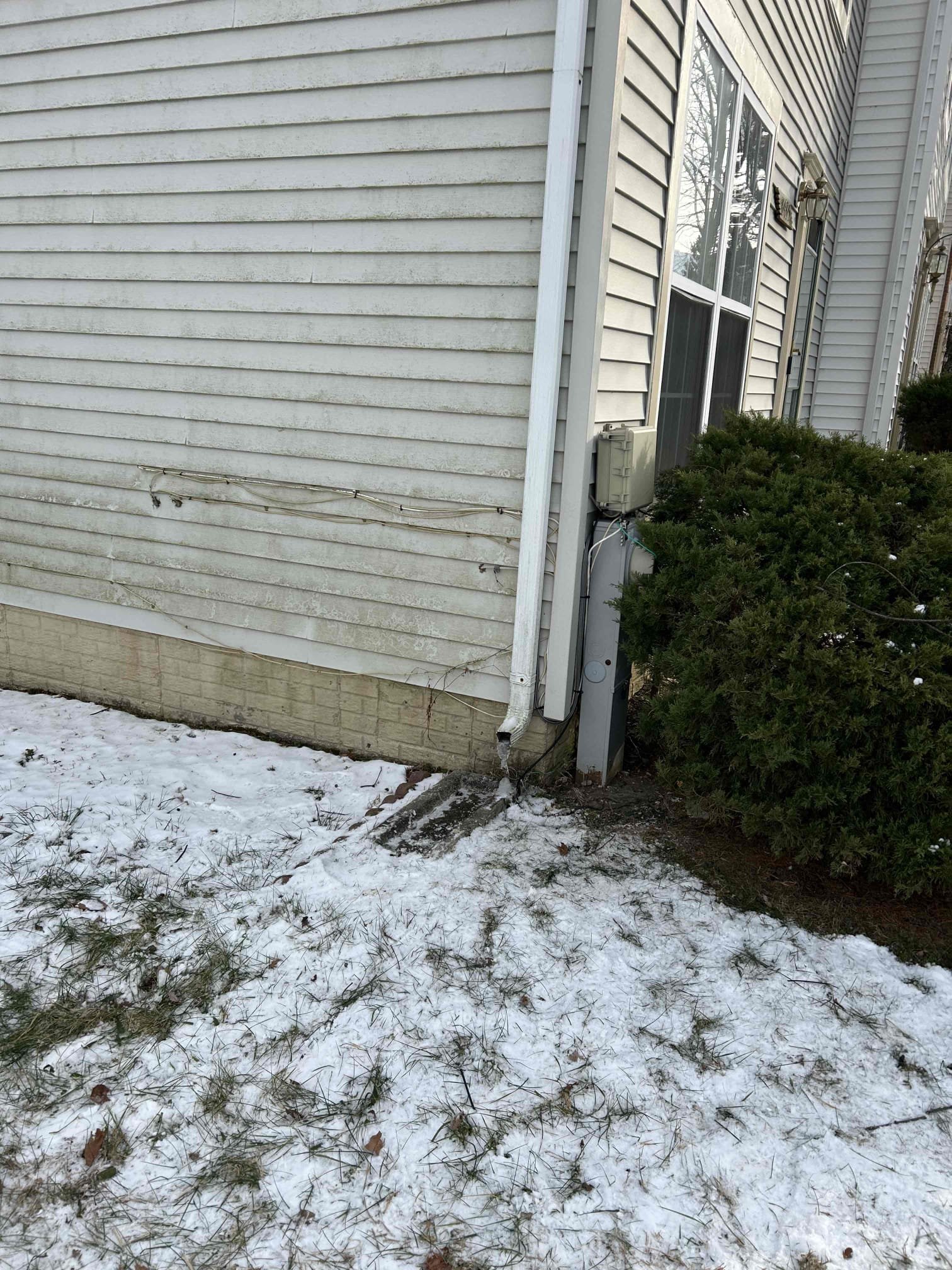 This solution includes running a new 15 amp circuit for upstairs bedroom and also 2 dedicated 20 amp circuit for ac in same bedroom then splitting the two upstairs bedrooms so they are on separate circuits. Also we will re device both bedrooms to ensure the best and safest possible connection throughout the electrical circuit.  These circuit must be protected by arc fault breakers due to the fact they are new circuits and the national electrical code requires them to be. We will run the circuits from the panel on the first floor to outside where they will be protected by UF wire which is rated to be outside. Neatly attached to the siding of the home then ran up the wall next to the drain then into the home on the back wall where the ac is plugged in at under the window and where the existing receptacle is.  We will silicone the holes where will drill into the home to prevent water getting into the wall 

We will install a whole home surge protector to protect all home electronics and h