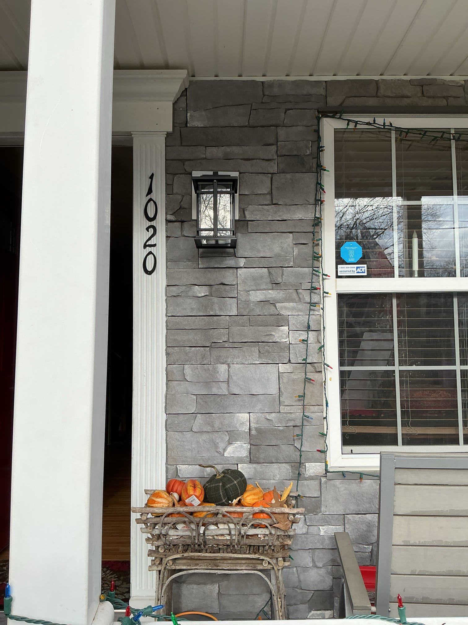 Replace front light on porch.