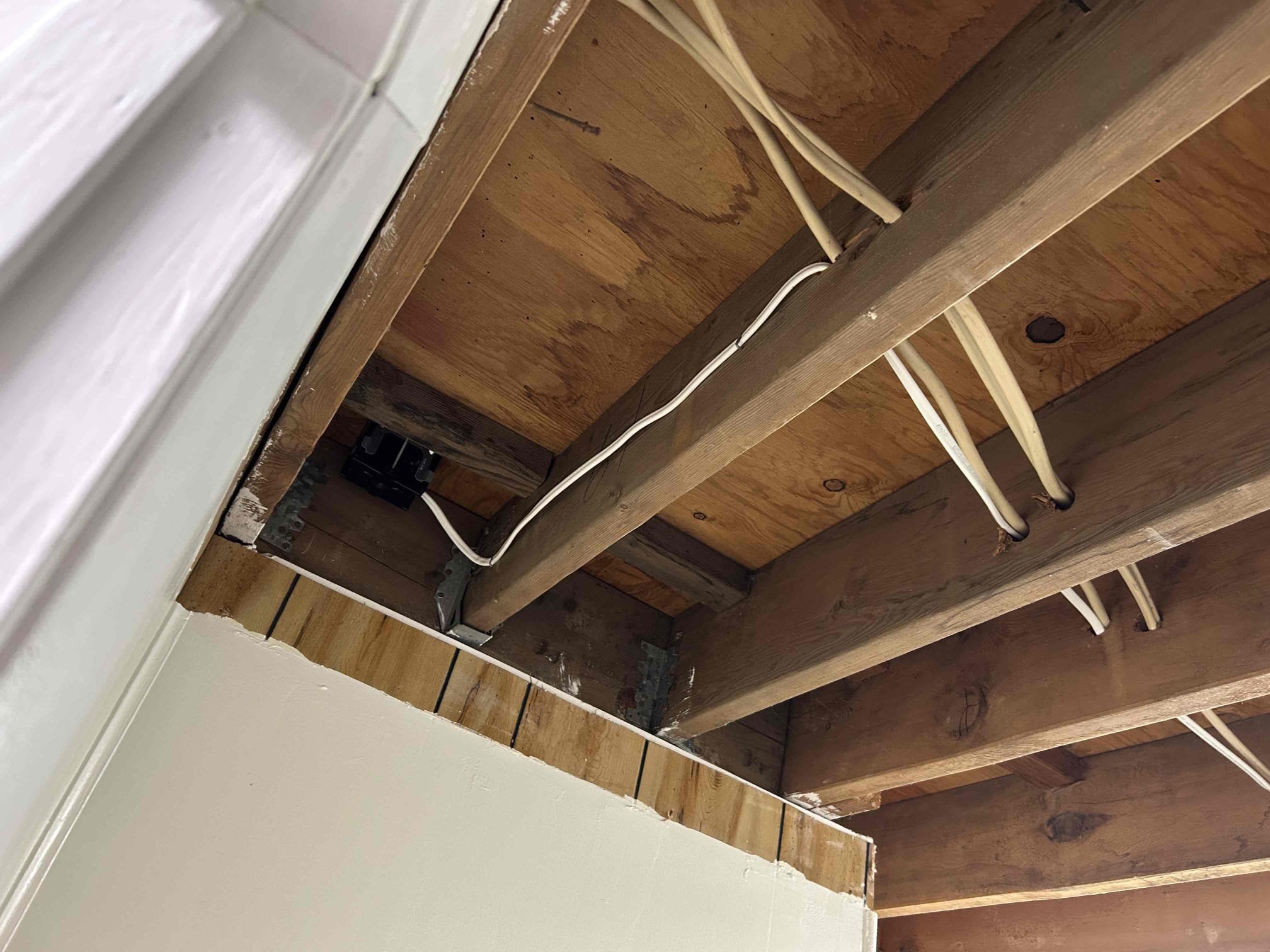 Install new wire to bath plug
Install floor receptacle in living room
Today we installed missing alumiconns in basement stairs light and removed hanging live line from above washer.
While onsite we installed a new floor plug on the first floor next to the stairs. 
We also ran a constant hot line to the basement bath gfci so it will now work when switch is off.