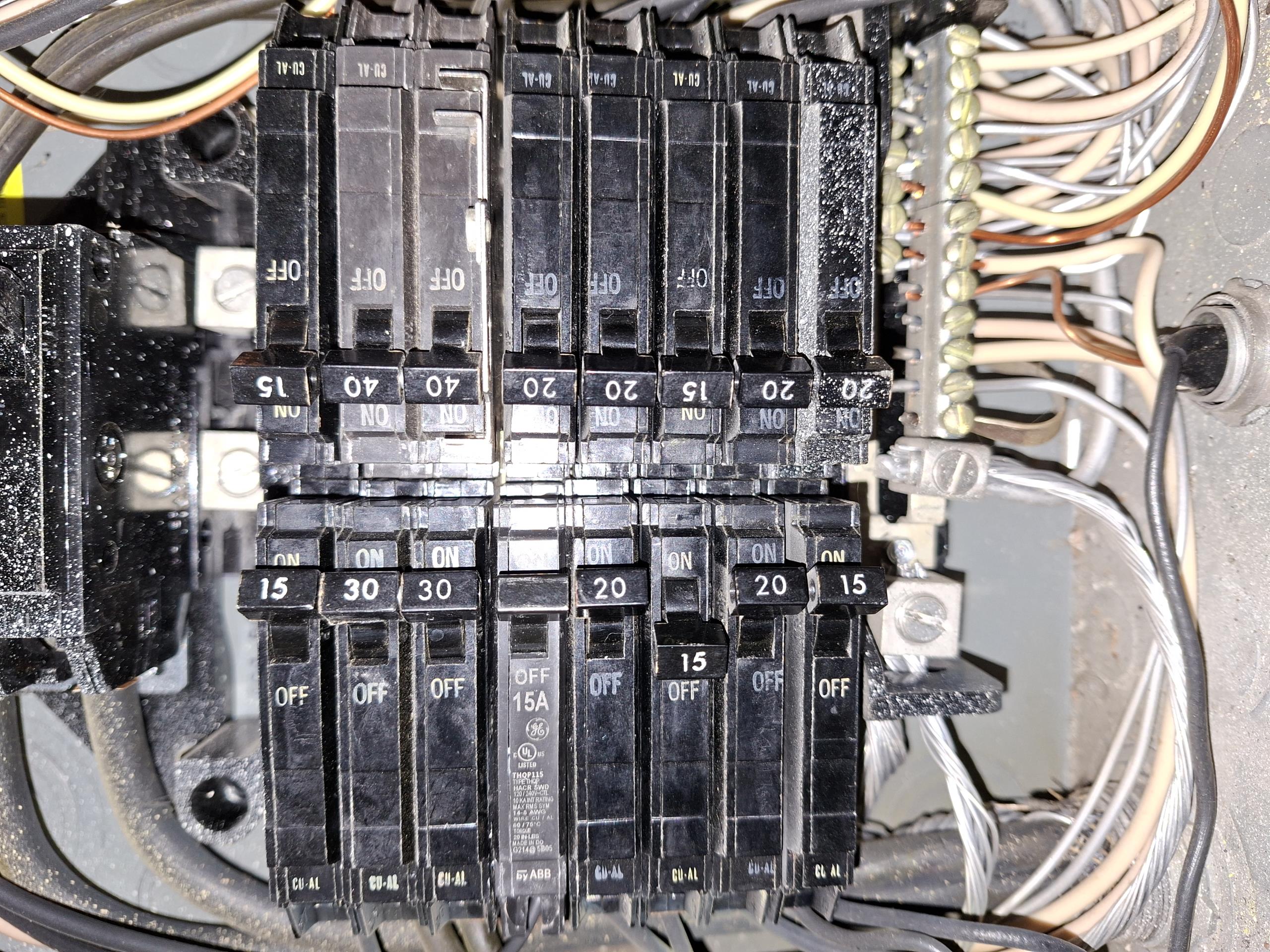 Replace GE 16 space 100 amp panel with a QO 30 space 100 amp panel. Install brand new QO breakers correctly sized for circuits and to account for any multiwire branch circuits. Update the grounding system with installation of 8 foot ground rods outside the home, run a bonding wire to the main water shutoff, and bond the water heater with a #4 ground wire between the hot, cold, and gas pipe. Install an emergency disconnect outside and by meter in accordance with county safety standards. Install a PSP Vortexx surge with a lifetime warranty and $100,000 of combined protection to meet county safety standards. Haas and Sons will coordinate with county inspectors and BGE throughout the entire process. 

Called out today to investigate receptacles that were burnt up and not working. Arriving on site, customer directed me to the upstairs office, where I could smell burnt plastic. Opening a receptacle, I discovered the wires to be completely burnt back, caused by a space heater that was plugged