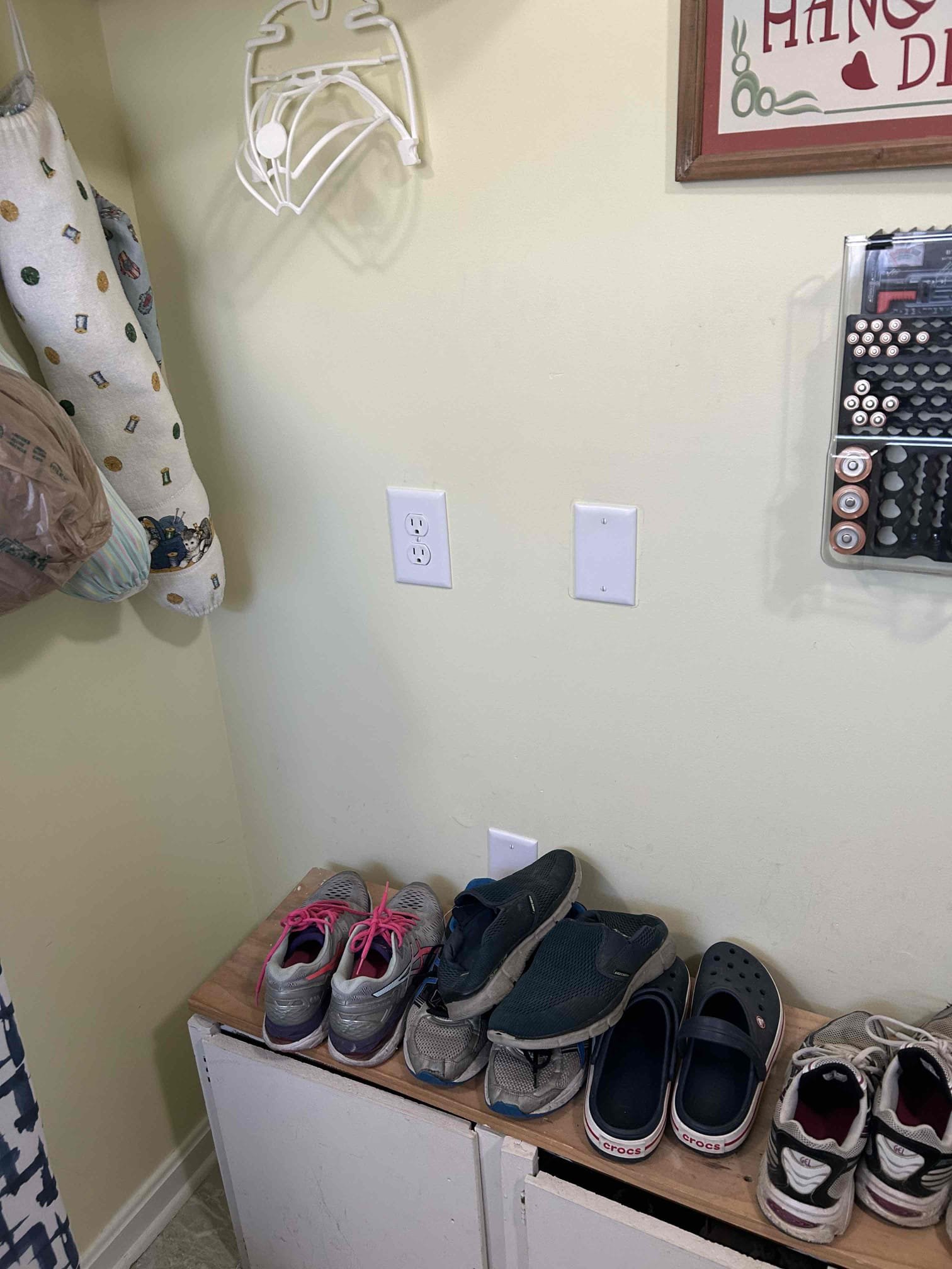 Install receptacle roughly 1 ft from existing location and blank off exiting receptacle.