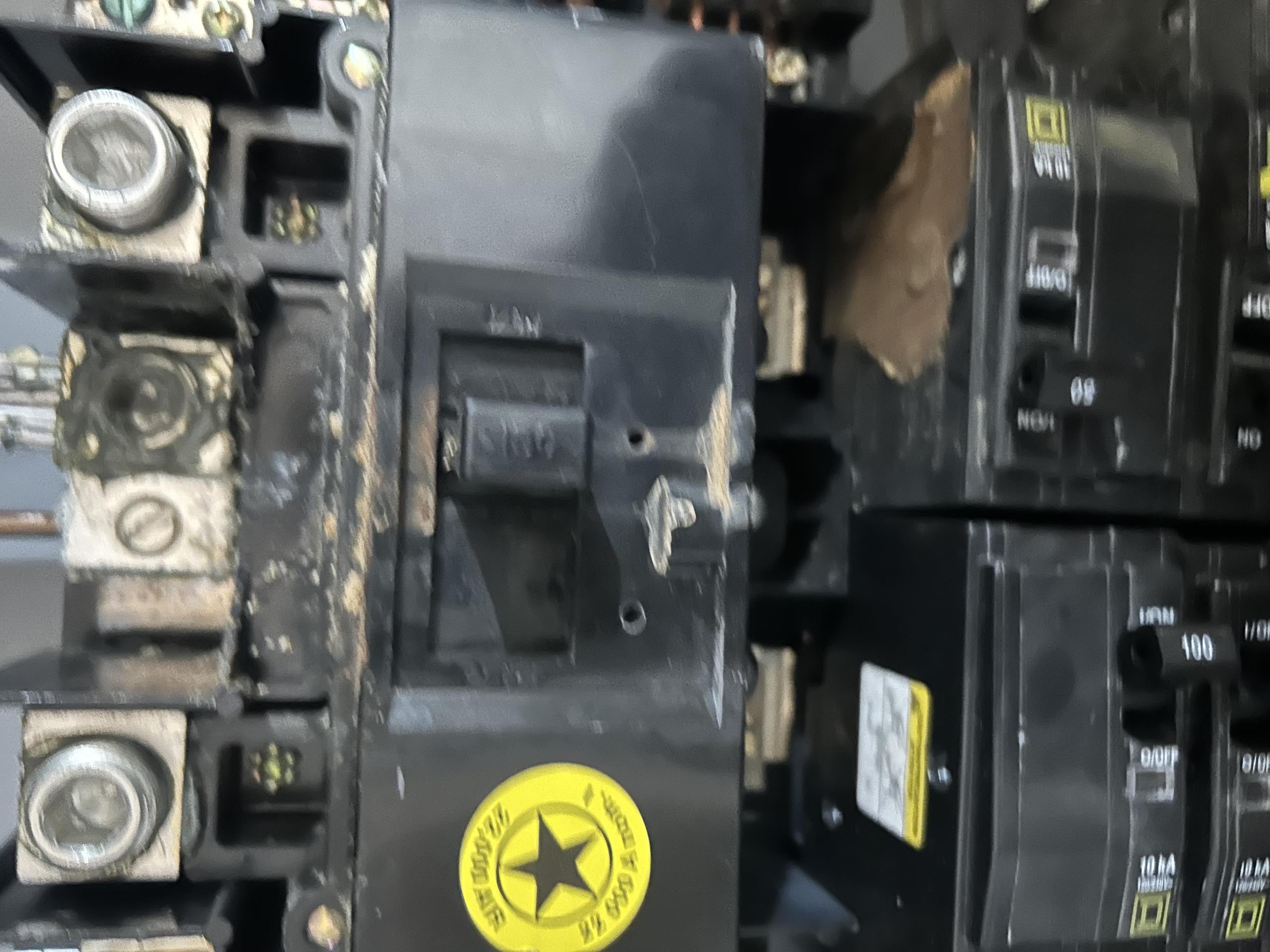 Called out today due to power loss of the upstairs, garage, and front foyer. I asked the customer to show me their main electrical panel. They told me they previously tried to reset the breaker, which immediately tripped and arc’ed. I saw that the main breaker was still tripped and tried to reset it. This resulted in a large arc flash and the breaker tripping once more. I could see signs of significant corrosion on the main breaker, branch circuit breakers, and in the bottom of the panel box. This directed me to outside, in which I saw that the service cable had a large tear in it. This allowed rain water to enter the service cable and pour into the main panel. The entire panel needs to be replaced, as well as the service cable entering the home, to prevent this from happening again. A permit will have to be pulled to complete the work. A permit requires us to update the home electrical system to current county safety standards. This means two emergency disconnects and two surge protec