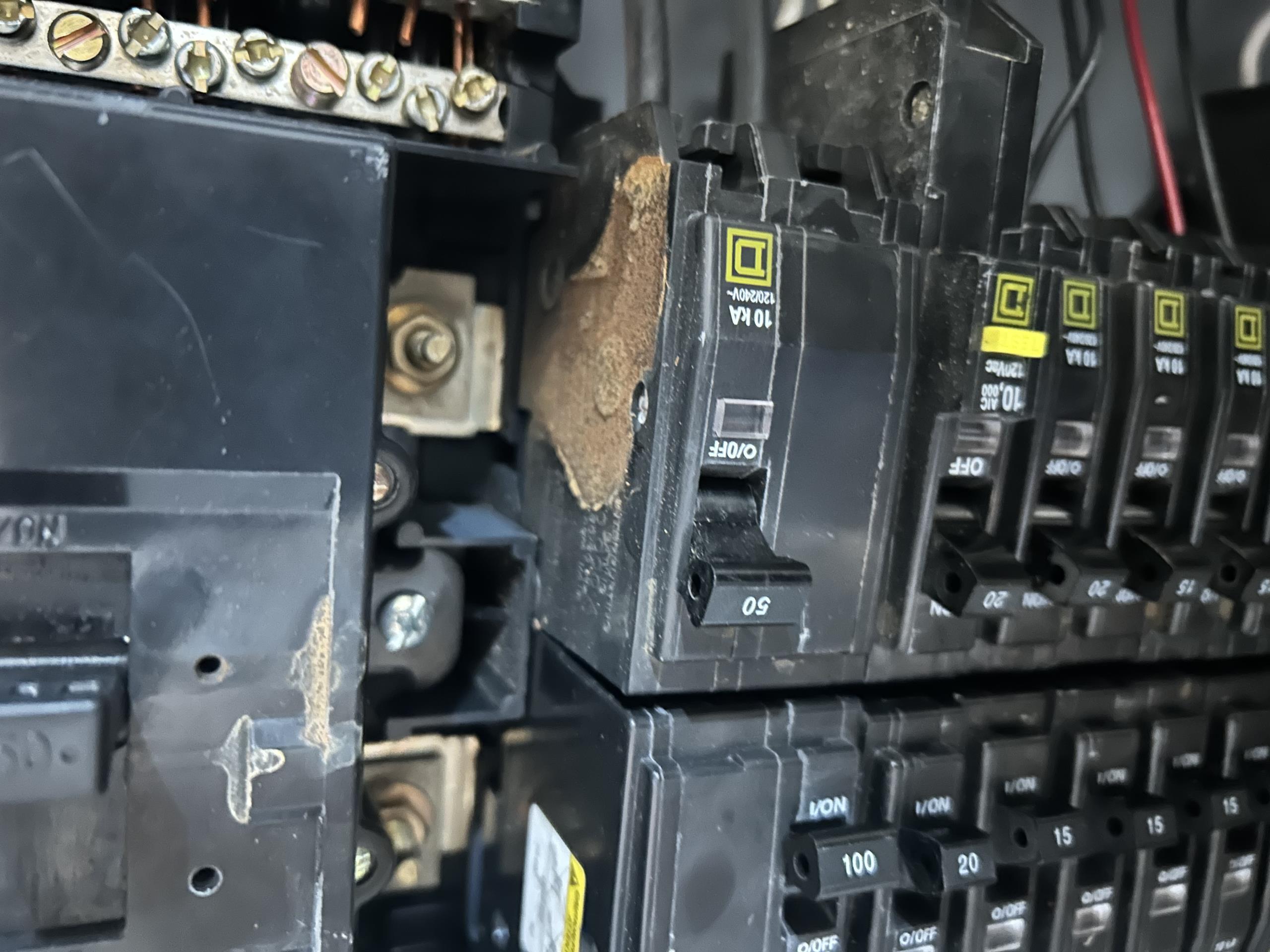 Called out today due to power loss of the upstairs, garage, and front foyer. I asked the customer to show me their main electrical panel. They told me they previously tried to reset the breaker, which immediately tripped and arc’ed. I saw that the main breaker was still tripped and tried to reset it. This resulted in a large arc flash and the breaker tripping once more. I could see signs of significant corrosion on the main breaker, branch circuit breakers, and in the bottom of the panel box. This directed me to outside, in which I saw that the service cable had a large tear in it. This allowed rain water to enter the service cable and pour into the main panel. The entire panel needs to be replaced, as well as the service cable entering the home, to prevent this from happening again. A permit will have to be pulled to complete the work. A permit requires us to update the home electrical system to current county safety standards. This means two emergency disconnects and two surge protec