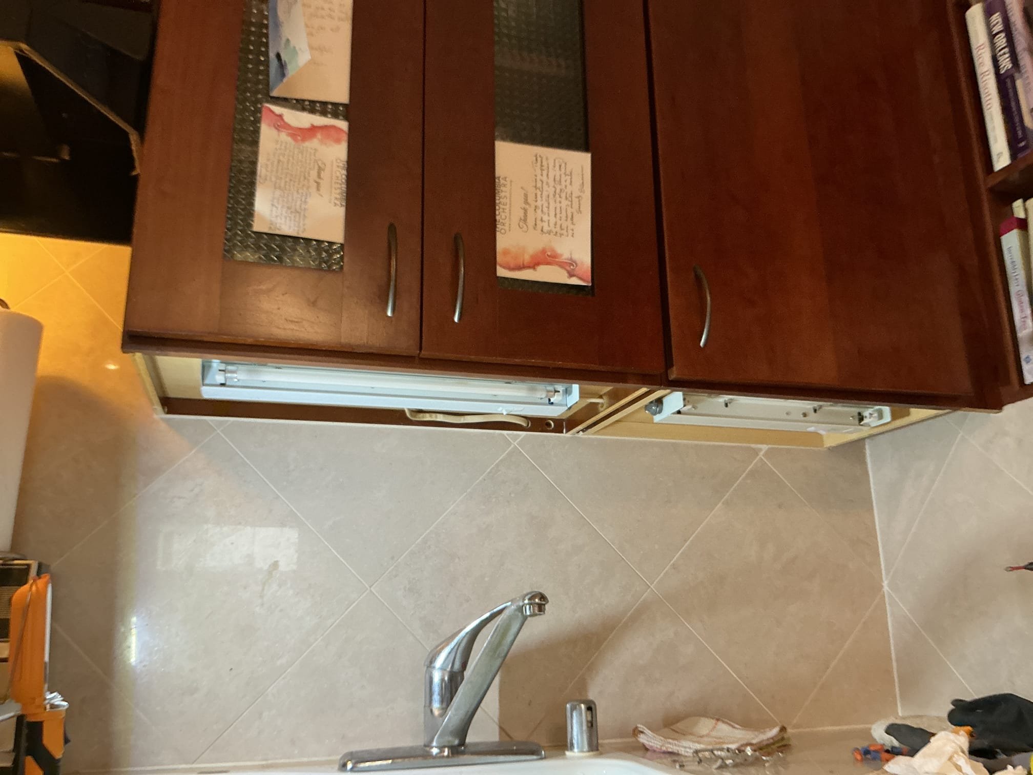 This solution includes the installation of 4 customer supplied lights. In addition we shall provide gfci protection at the exterior receptacle and washer receptacle. We shall also install gfci protection in the basement of 4315, 2 total.

We have replaced the under cabinet lights in 4314 also installed gfci protection at exterior and washer.

We have installed gfci protection for washing/dryer equipment and sump pump.