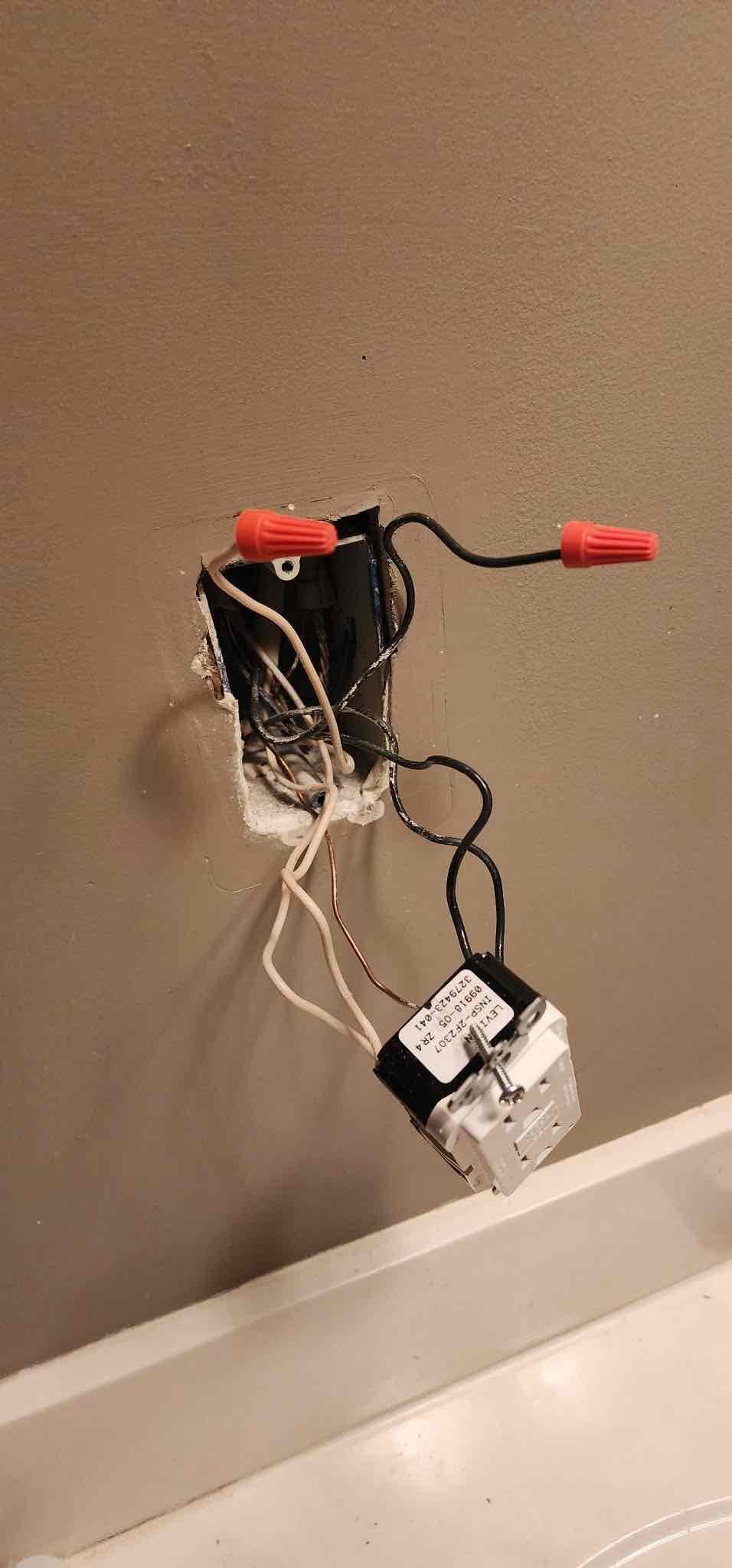 Today's visit was due to a power loss in the bathrooms and exterior circuit. Throughout the troubleshooting process, we discovered a burned up neutral in the basement utility area that caused the power loss of the bathroom/exterior circuit. There was also a power loss in the living room and downstairs bedroom at one receptacle that was caused by the device being backstabbed and the connection being lost. We took note of the fact that the devices throughout the home being all original to the home, the overall power loss/retention of the circuits will only persist until the underlying backstabbing issue is resolved in the areas of the home excluding the devices replaced on the bathroom circuit. We replaced all devices on said circuit, which included 4 GFCIs in the bathrooms, a receptacle in the utility room, and a weather-resistant GFCI/in-use cover on the exterior. The receptacles we replaced in the living room and basement bedroom are not warrantable, we offered to estimate for a whole