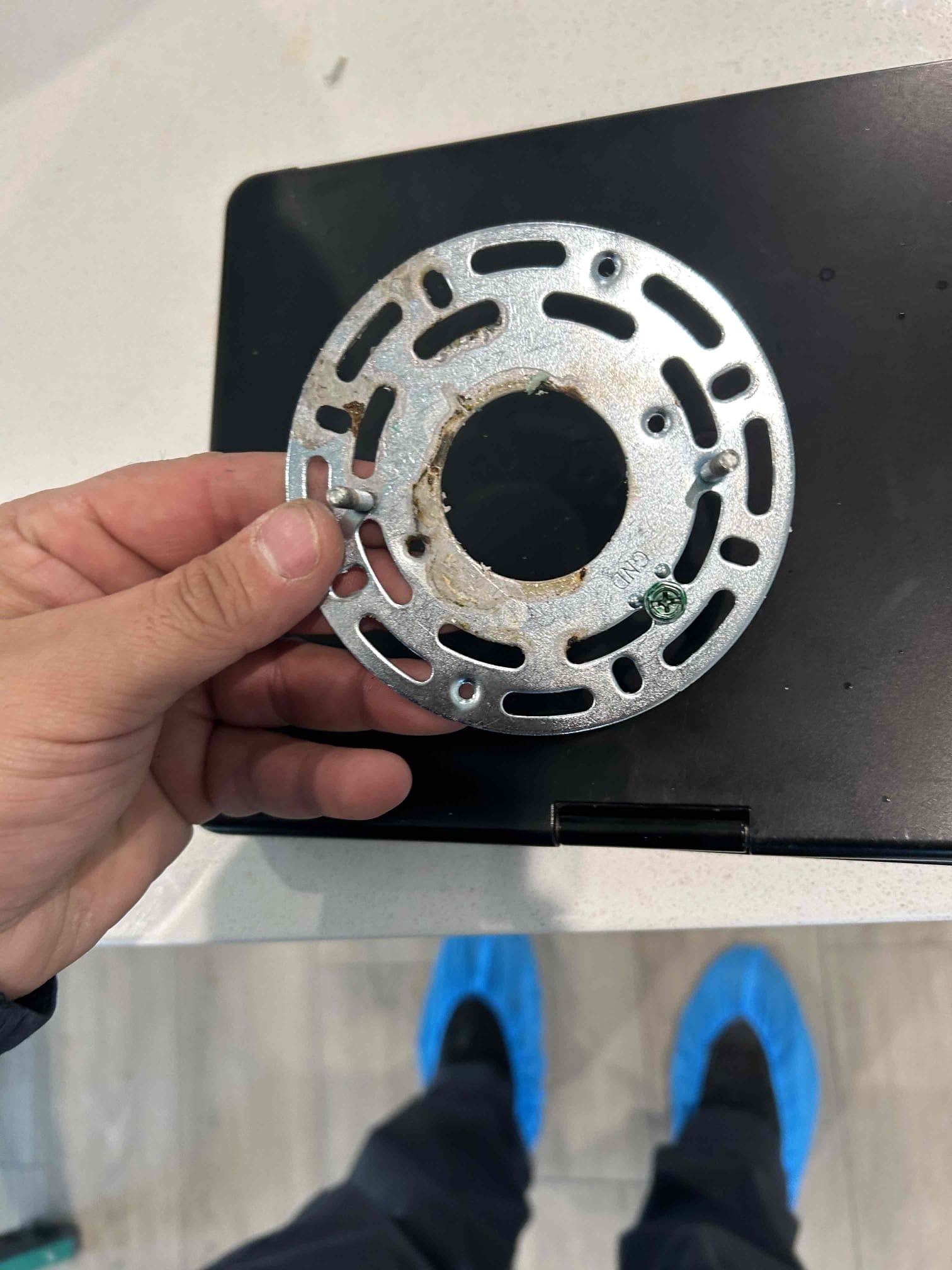 Trouble shot, tripping our fault breaker for the kitchen lights and found that there was a slow leak coming from the trap for the shower above the light fixture. This was causing water to drip down inside the light and caused it to ground out causing the breaker to trip.