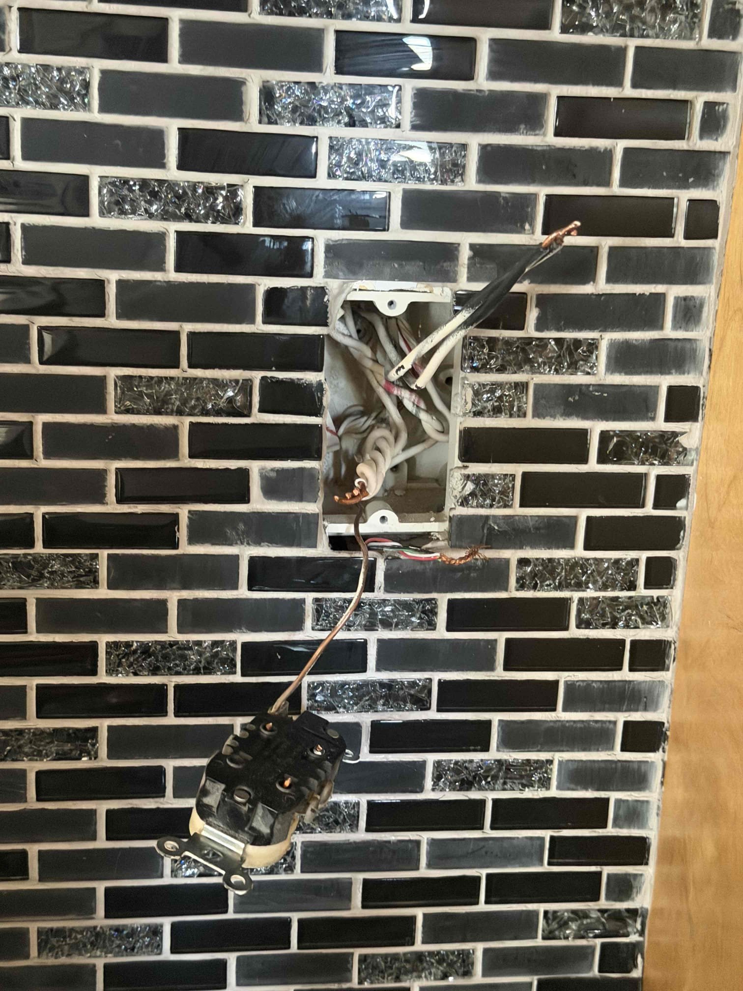 Installation of new devices located on the kitchen counter top. We will replace the outlets with proper GFCI where needed as well as changing out the light switches. 

Installation of new outlet and box for the GFCI located downstairs at the sump pump. 