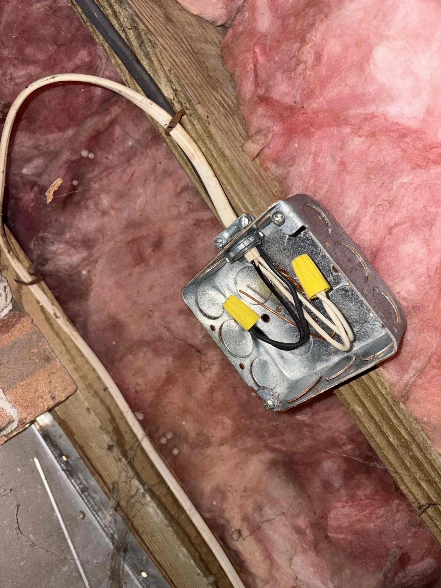 Extended diagnostic 
 Troubleshot tripping breaker for the kitchen lights to find out that the garage is also on with this circuit. What is happening is that when the ground is wet it is causing the wire that is ran underground to the shed to dead short and trip the breaker.
We disconnected the wire in the hidden junction box underneath the addition under the kitchen.