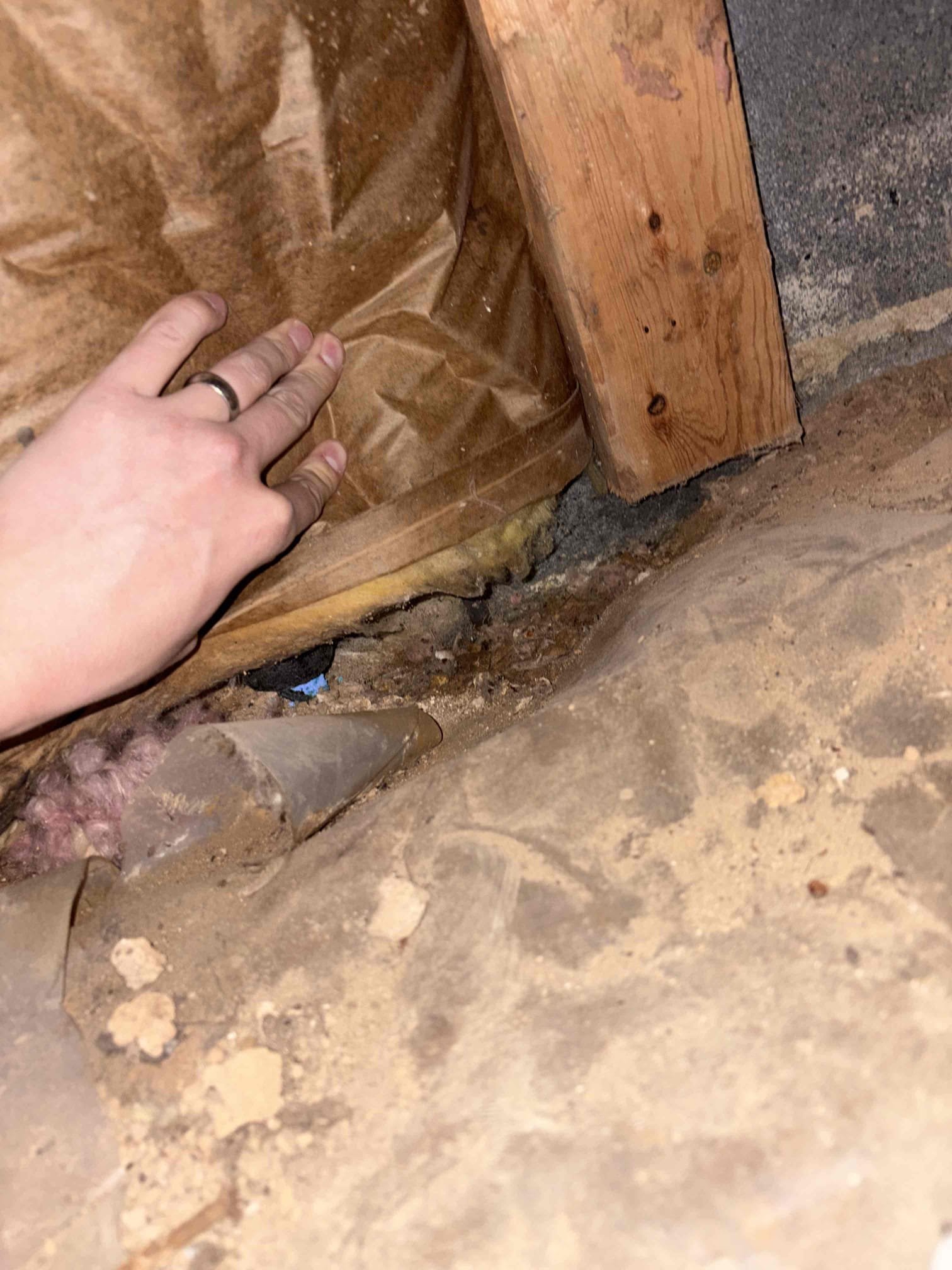 Extended diagnostic 
 Troubleshot tripping breaker for the kitchen lights to find out that the garage is also on with this circuit. What is happening is that when the ground is wet it is causing the wire that is ran underground to the shed to dead short and trip the breaker.
We disconnected the wire in the hidden junction box underneath the addition under the kitchen.