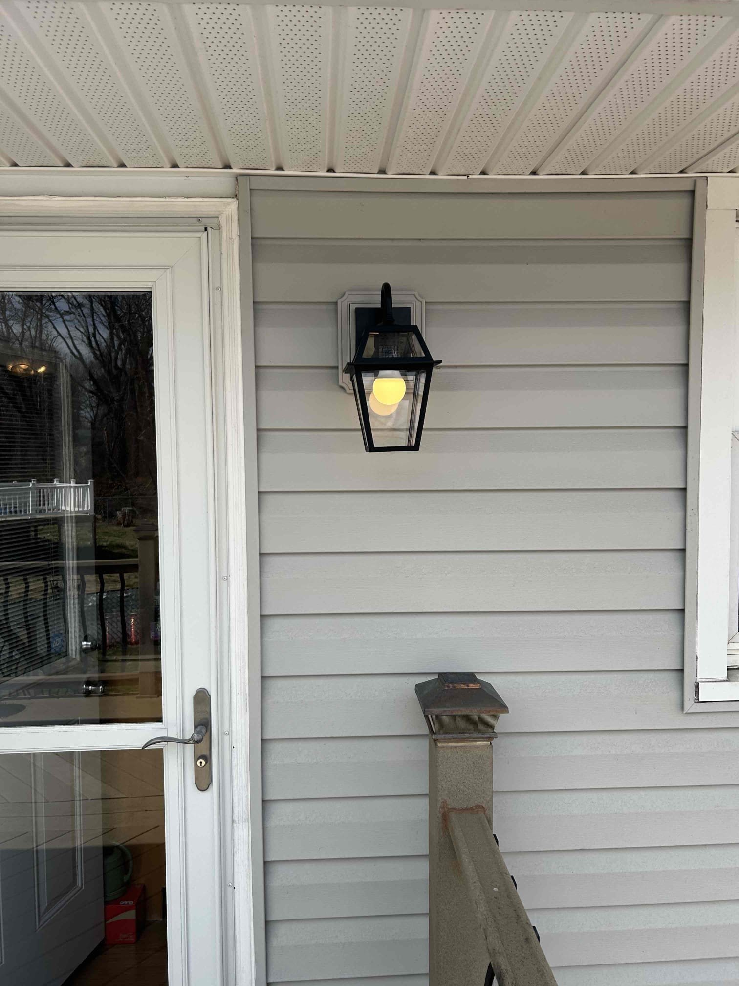 Replace 2 exterior sconce lights on the back of the home.

Well, on site, we inspected the main panel and found that the service cable was still deteriorating. It would appear that it is beginning to drywall further down than where it was a few years ago. Highly recommend having this addressed as water is getting inside of the cable and will eventually start running down into the panel as well as the meter can. 
We provide a pricing to upgrade the main panel while replacing the service cable to meet new current safety and code requirements.