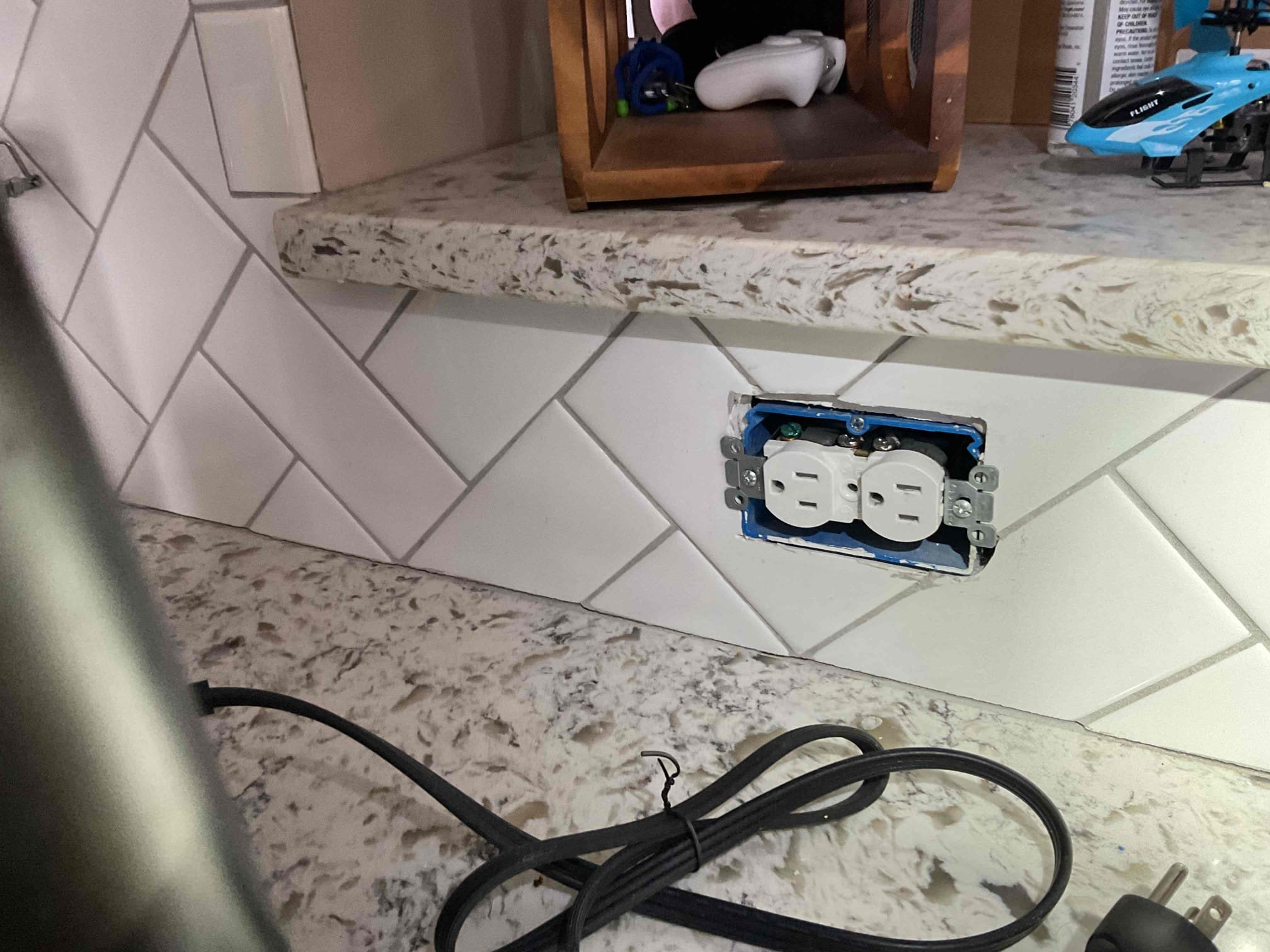 The reason for today’s visit was for the annual VIP Maintenance inspection. Upon my arrival, I started the inspection at the main electrical panel, which was a Cutler-Hammer 200A from the 80’s. Overall, the panel did not show signs of corrosion or severe damage, but there were a few safety concerns. Firstly, I noticed some double-tapped ground & neutral wires that needed to be separated. There were also three circuit breakers that would refuse to tighten, as well as a lack of whole-home surge protection. While I was in the basement utility area, I also took note of some needed GFCI protection. Continuing through the home, I pulled a few receptacles/switches to inspect the wiring and noticed backstabbed connections and loose plug retention throughout the home, which can cause power loss of devices until repaired/replaced. The devices are mostly original to the home and would benefit from a whole-home redevice, which I informed the homeowner of. I noticed a few other safety concerns incl