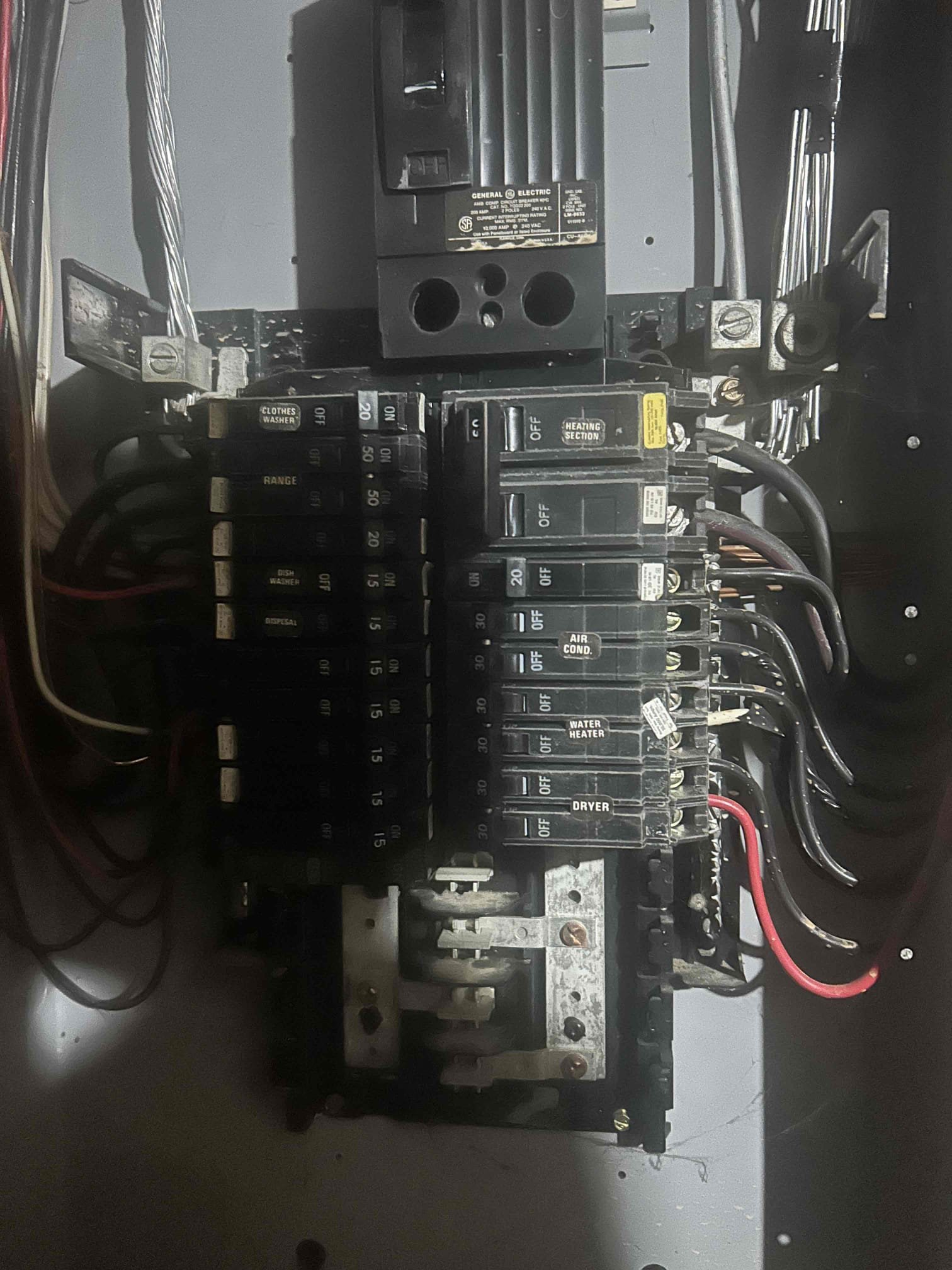 The reason for today’s visit was to assess power loss to kitchen receptacles. Today we found that the breaker feeding half of the kitchen had went bad. We opened the panel. We noticed that there were signs of water damage that had happened in the panel. We provided an option to replace the breaker as well as to replace the entire panel.
We’re checking the receptacles. We noticed that they were all still the original 1987, which were all backstabbed. Highly recommend replacing the devices to avoid future power loss issues.