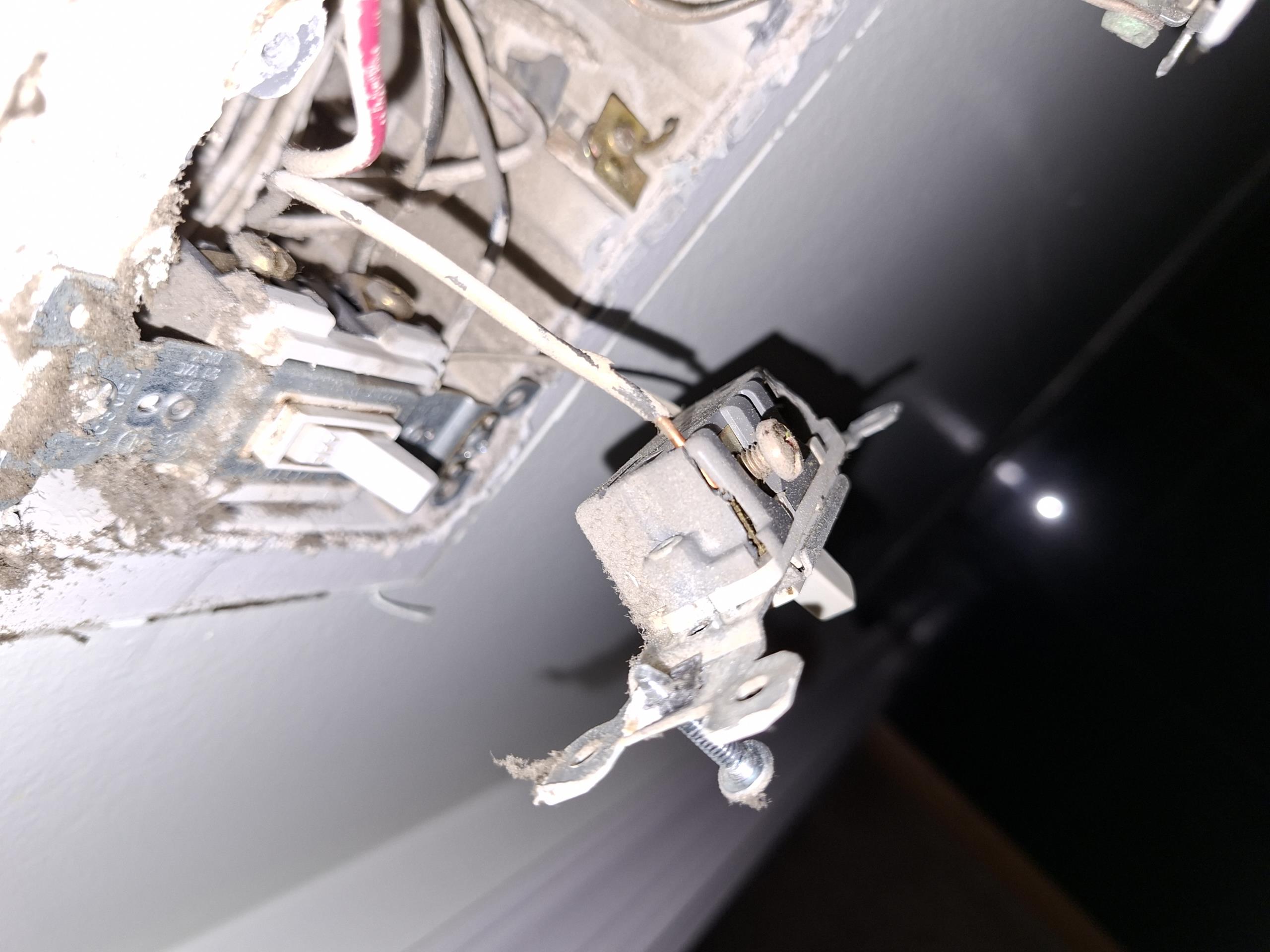 Called out today to give solutions for install two new customer supplied fixtures in place of a single light fixture located in the main bathroom. While performing my safety assessment, I saw a multiwire branch circuit not on the correct two pole breaker in the main panel, and a lack of surge protection. Assessing the bathroom, I opened up the 3-gang switch bank controlling the light in bathroom, and saw that all the switches were starting to break and were backstabbed. One of the switches was completely broken, but we were unable to determine what this switch controlled. Due to the nature of the install, I would temporarily remove the mirror, allowing me to cut the dry wall behind the mirror to run my wires from the current fixture box. This would allow me to conceal any cuts I would have to do in the drywall. 

I gave solutions to install surge protection, correct the multiwire branch circuit, replace the switches in the 3-gang box, and install the customer supplied fixtures with new