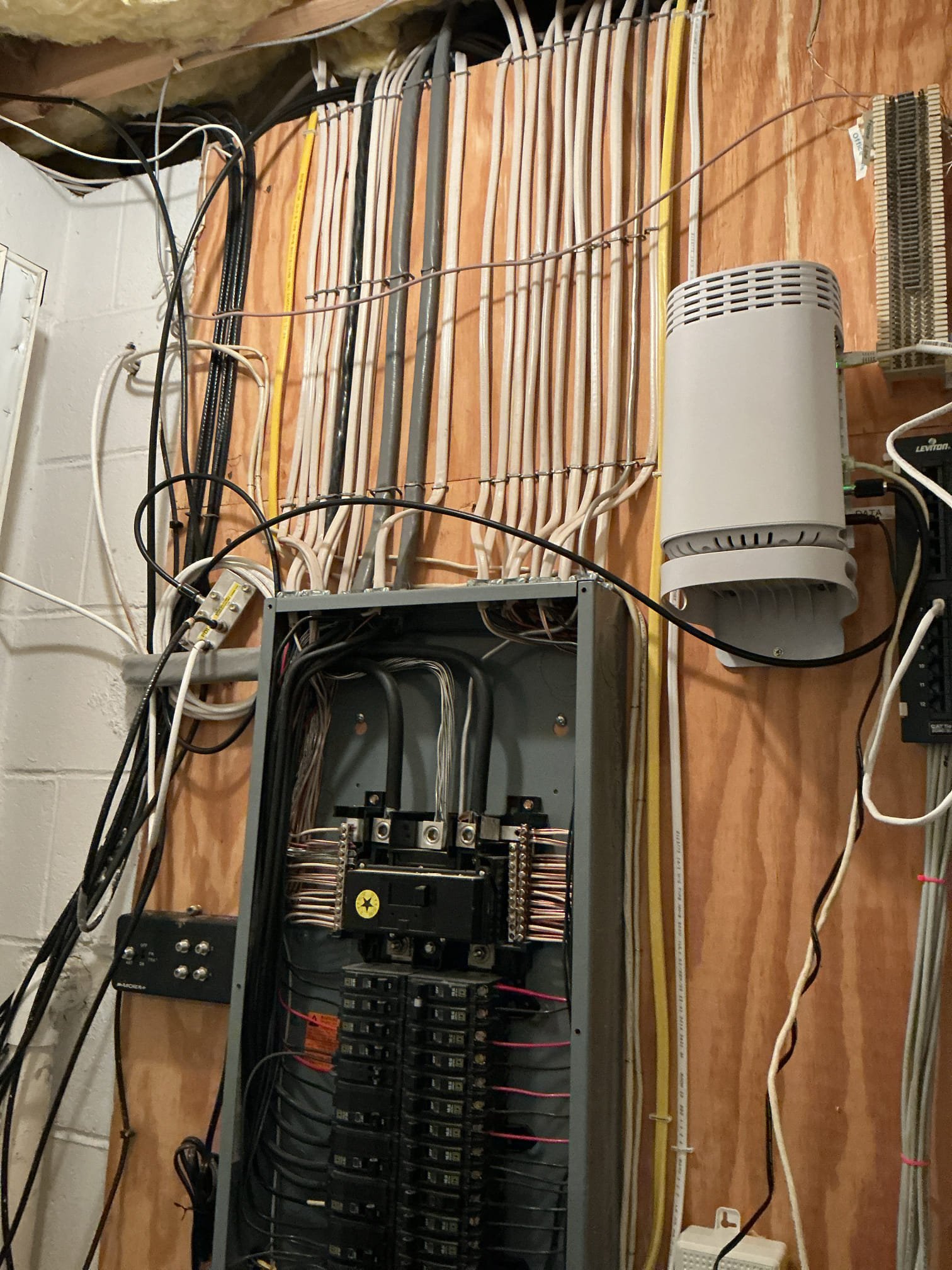 Installation of new devices throughout the garage circuit. This includes two outlets located in the garage, one outlet located in the basement utility, and one exterior. We will replace with proper GFCI where needed and the exterior will be replaced with a new WR cover and outlet. Installation of new two pole breakers to eliminate the shared neutral circuits. Shared neutrals are illegal and unsafe due to risk of over heating and shock hazard. 