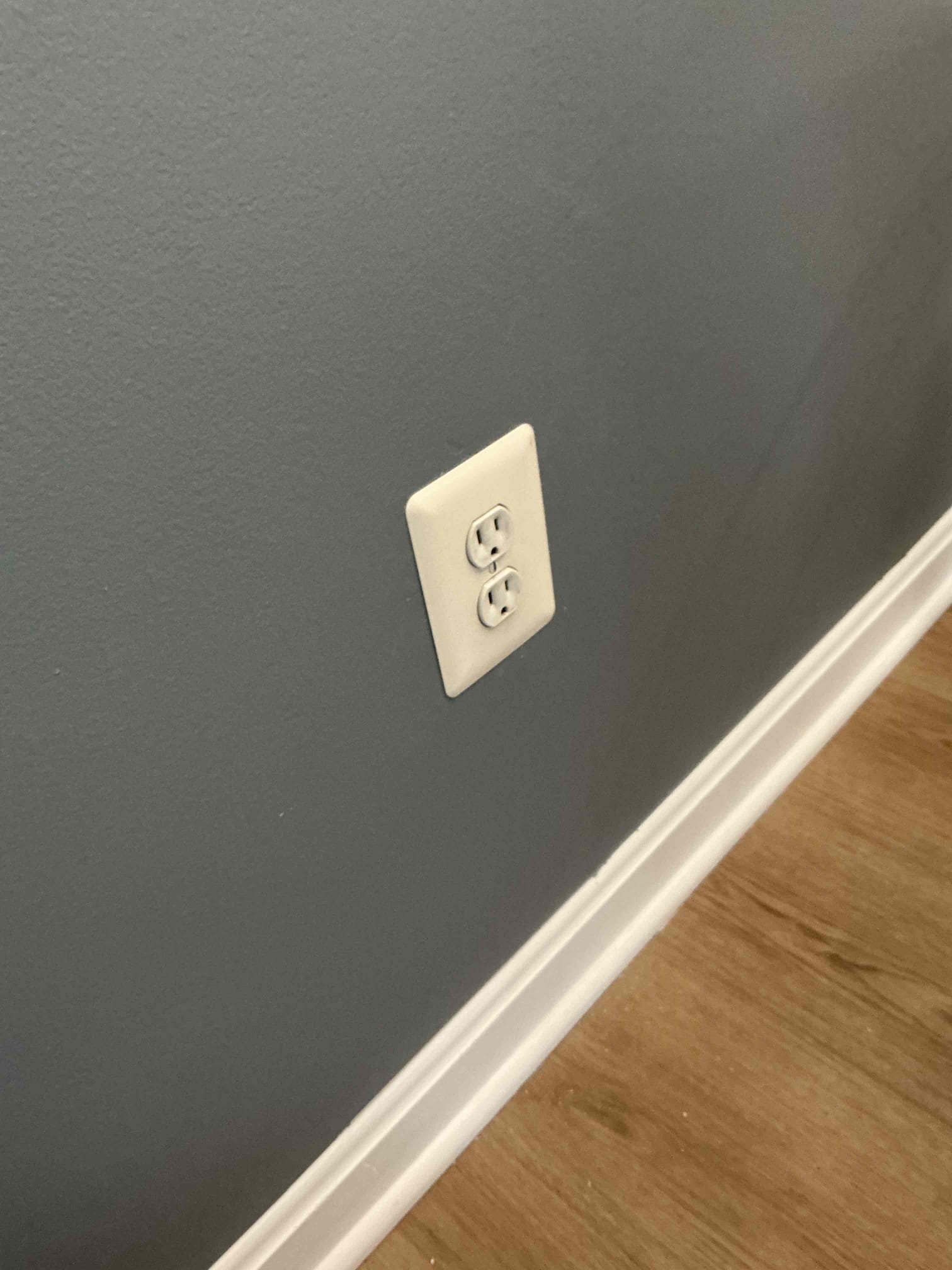 Re-secured receptacle to wall and plugged checked everything. 