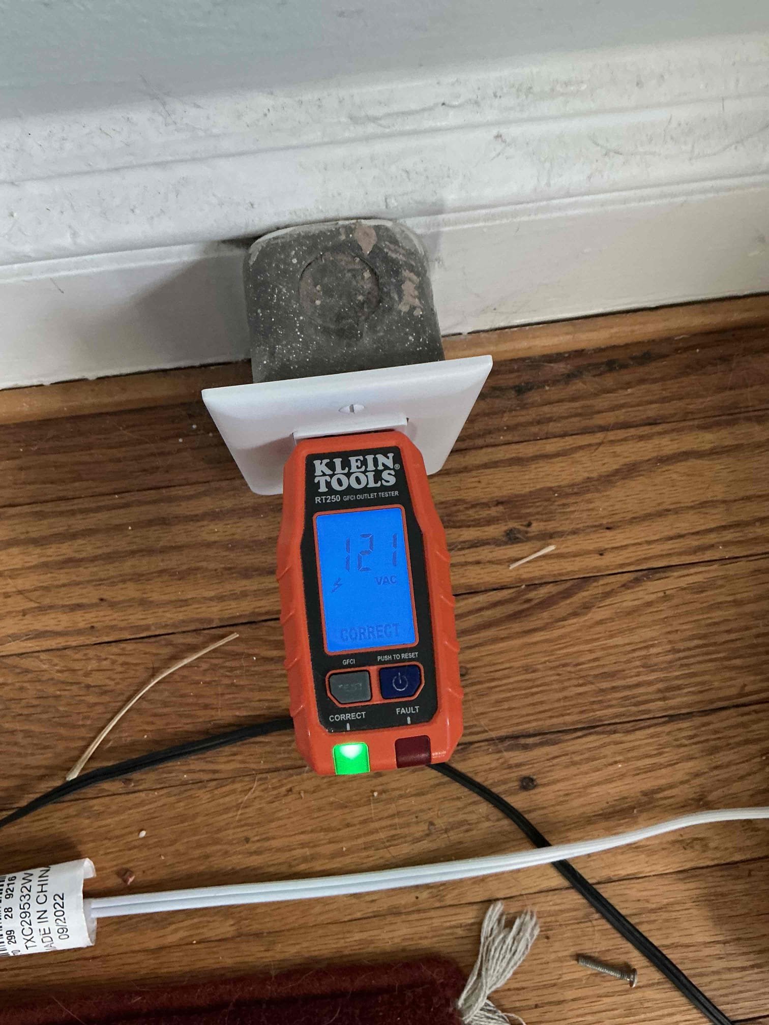 Replace 120V receptacle that is wired with 240V with a GFCI receptacle as there is no ground present in the box to make it a safe and proper installation. During our check up last visit we suggested a whole home re-device, which I still strongly suggest given age, condition and wiring method. 