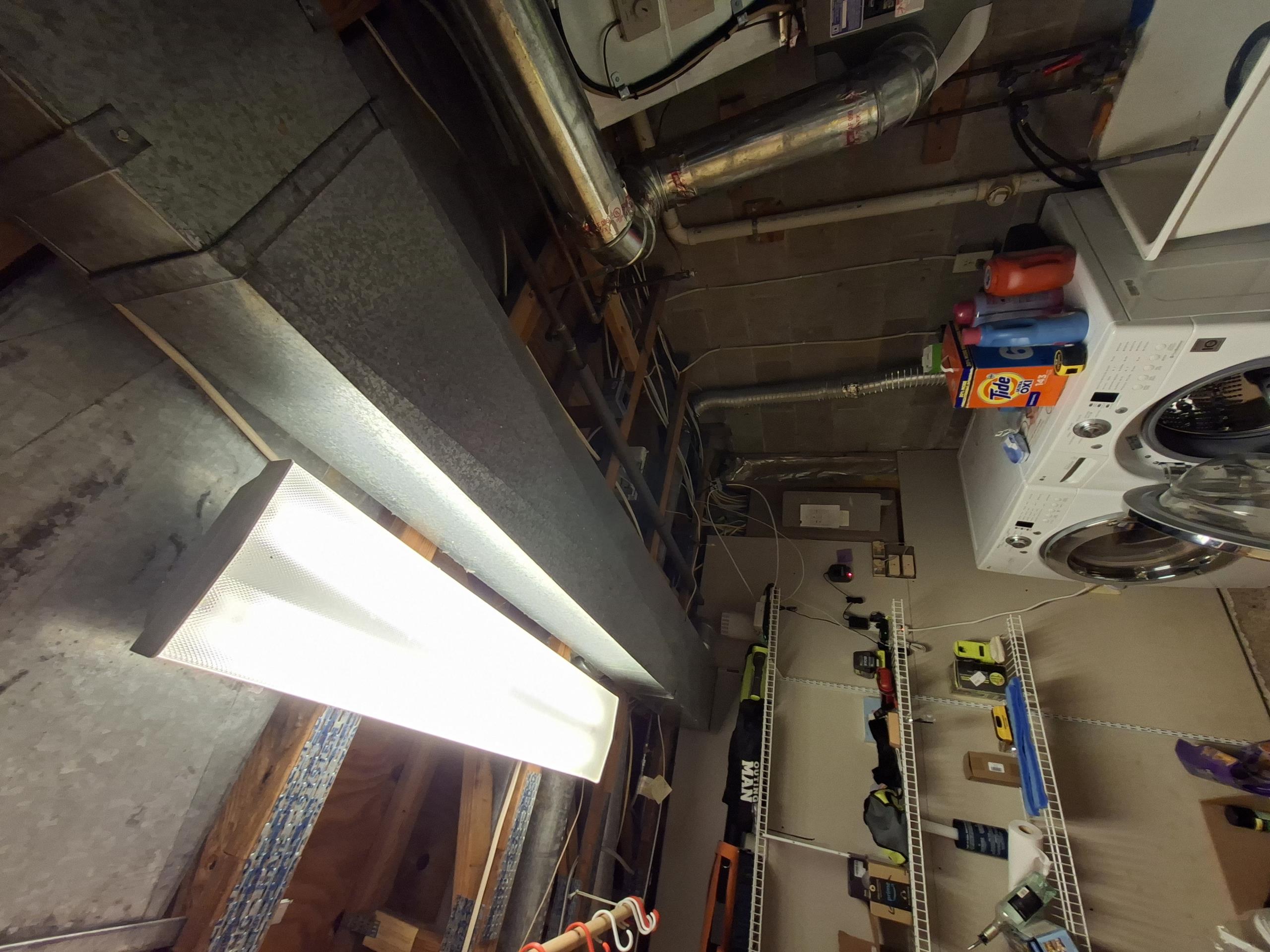 Install a dedicated 20 amp circuit from panel to directly outside by meter can. Install a surfaced mounted box, with a GFCI and the proper weather proof cover. Two single pole circuits will have to be combined to make space inside of the main electrical panel for the new circuit.