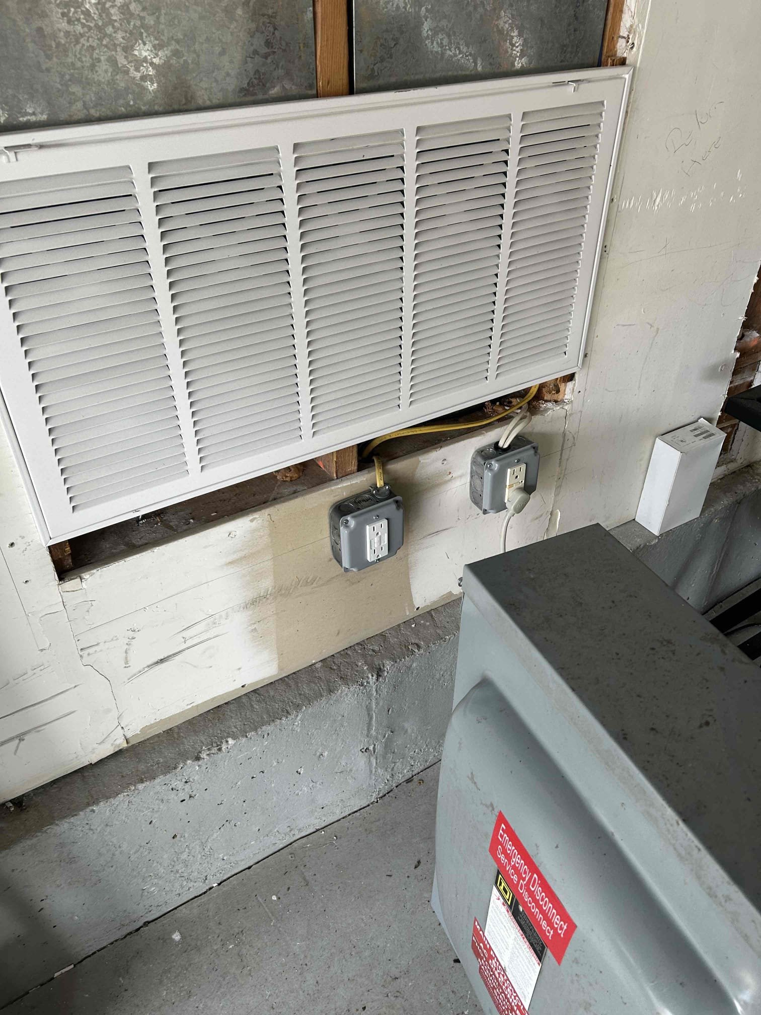 We will remove the existing 400 amp disconnect and install (2) customer supplied disconnects over the existing ports going into the trough. We will supply the PV labels to be installed on the new disconnects. We will bring out some scrap 4/0 alum wire in the event any of the conductors needs to be replaced due to being too short. Power will be out while this work is being performed. 

The stickers are on order. I will reach out once received to schedule the work. 

Once completed, we can call back in for inspection. 
Remove dangling devices hanging in the garage and surface mount two new GFCI to the wall in their place.