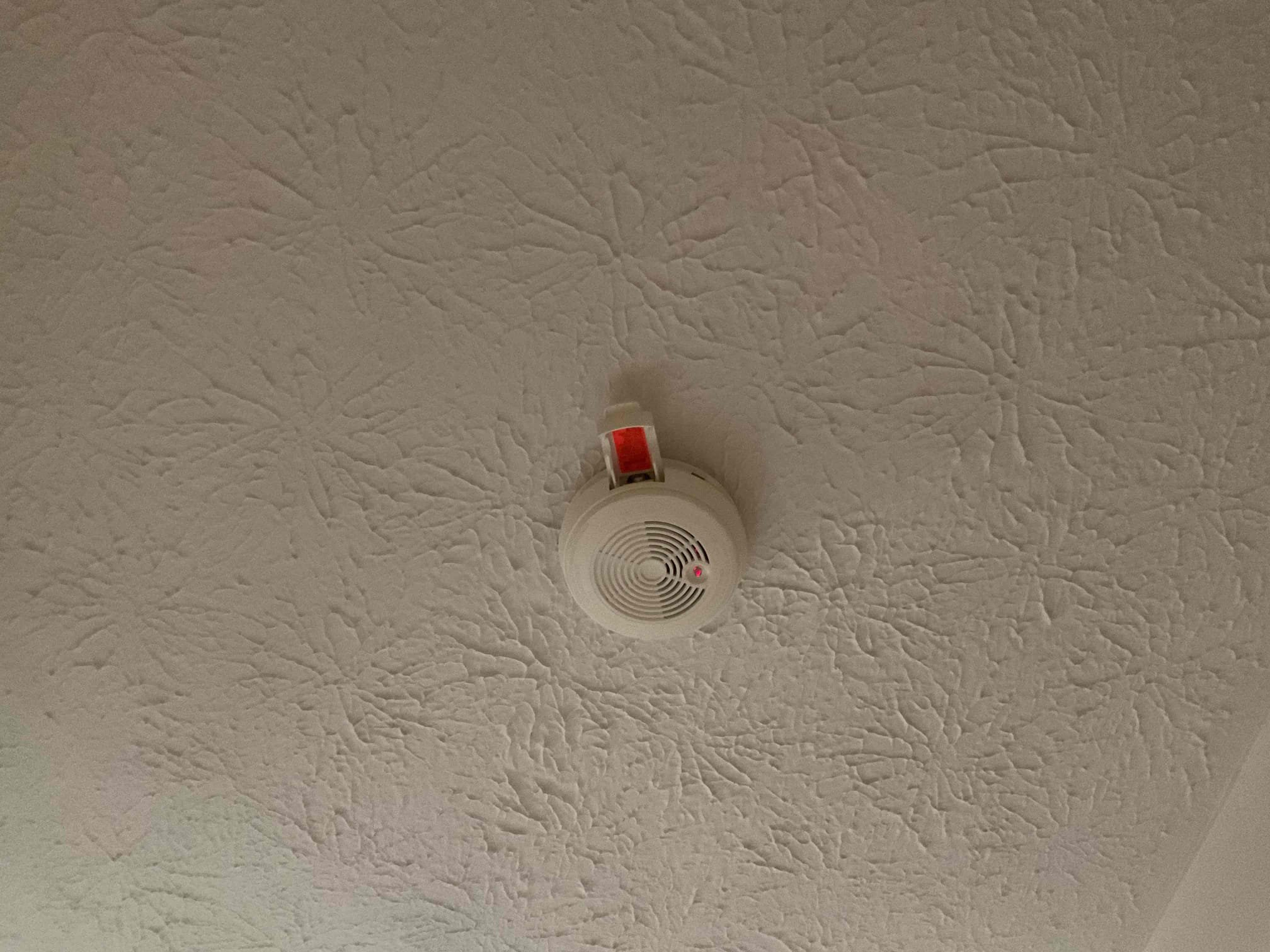 Today's visit was to take a look at installing two new LED Flat-Panel lights in the kitchen in place of two original fluorescent fixtures. When I arrived, I took down the light cover to determine which circuit was linked to the lighting, and found that the location for the fixture boxes were not conducive to the requested layout of the new (more rectangular) fixtures and the circuit would need to be extended to those new locations. I also noticed that the smoke detectors in the home were older/missing/had no batteries. I offered to provide a solution to install new units and Ms. Arlene let me know that they had two new hardwired/interconnected Smoke/CO detectors that I could use. My solution(s) today included installing the two new kitchen light fixtures, changing a 3-way switch to control said lights with a dimmer, and to replace the customer-supplied detectors. I started by changing the detectors, and re-wired with new splices at both locations due to paint covering the splices. I mo