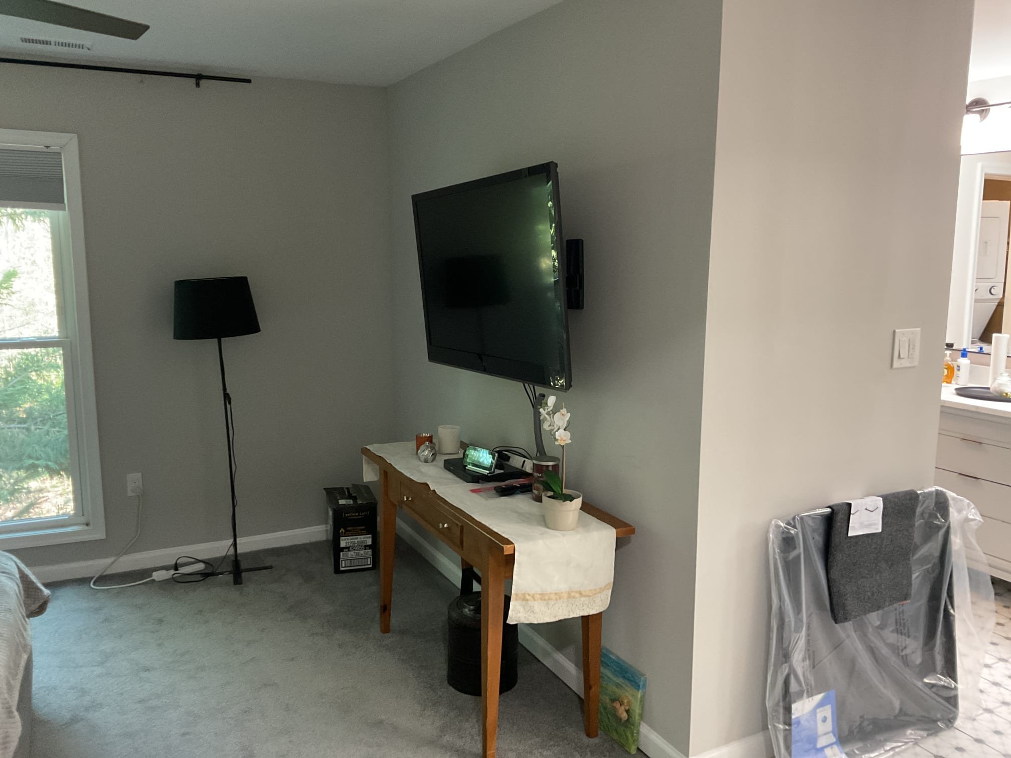 Today’s visit was to look at adding a dedicated circuit to supply power to a new washing machine. The washer/dryer will be individual units replacing a current 240V stackable laundry center. The current 30 Amp line will support the new dryer, but a new 120V/20A line is necessary for the washing machine. I started by taking a look at the location of the laundry, which is in the master bathroom’s water closet. To run the new circuit, we would be bringing a line from the electrical panel located in the basement in the front left corner of the home. We would take the new circuit and fish through a bulkhead in the basement, continuing on the exterior of the home underneath the deck, and then up the exterior wall to bring the circuit inside. The circuit would be installed with a new GFCI-protected breaker to meet current code standards/safety minimums. During my visit, I noticed a lack of whole-home surge protection and provided a solution that also included the installation of a PSP Vortex 