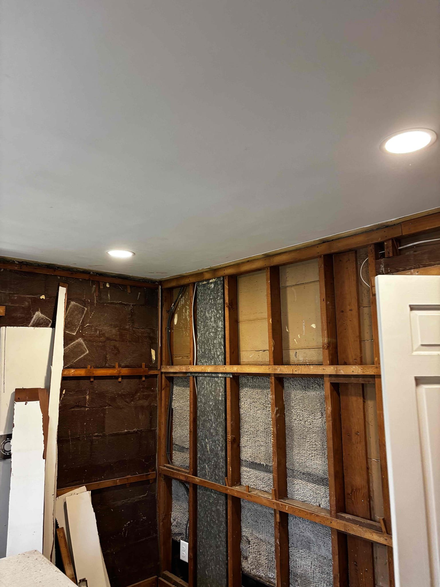 This solution includes the installation of 4 recess lights in the office as well as installing a new receptacle in the office closet.
Installation of new boxes for five receptacles in the office
Installation of a new receptacle in the closet, tapped off of existing power in the back wall of the office.