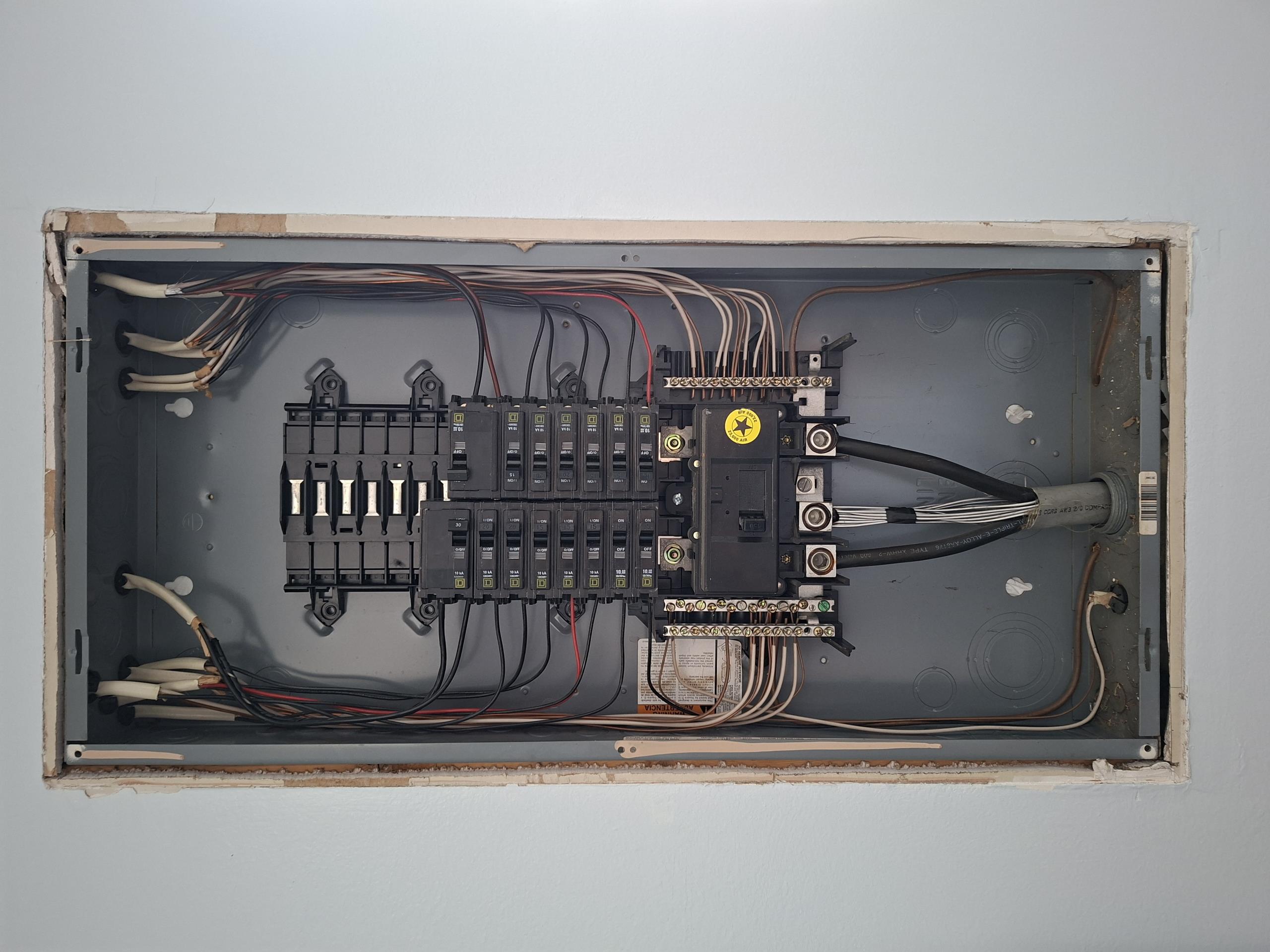 Install two customer supplied lights in the kitchen and outside the front door. Install customer supplied timer switch. 

Called out today to install two customer supplied lights and install timer switch and to determine what caused the front light to stop working. Taking down the front light, I discovered a wasp nest inside the light box, with damage to the insulation on the hot conductor. I cut this conductor back and spliced extra wire to it, and install the light and switch, and the light worked. I removed the old fluorescent light in the kitchen and replaced it with a customer supplied LED light, set to 4000 Kelvin.