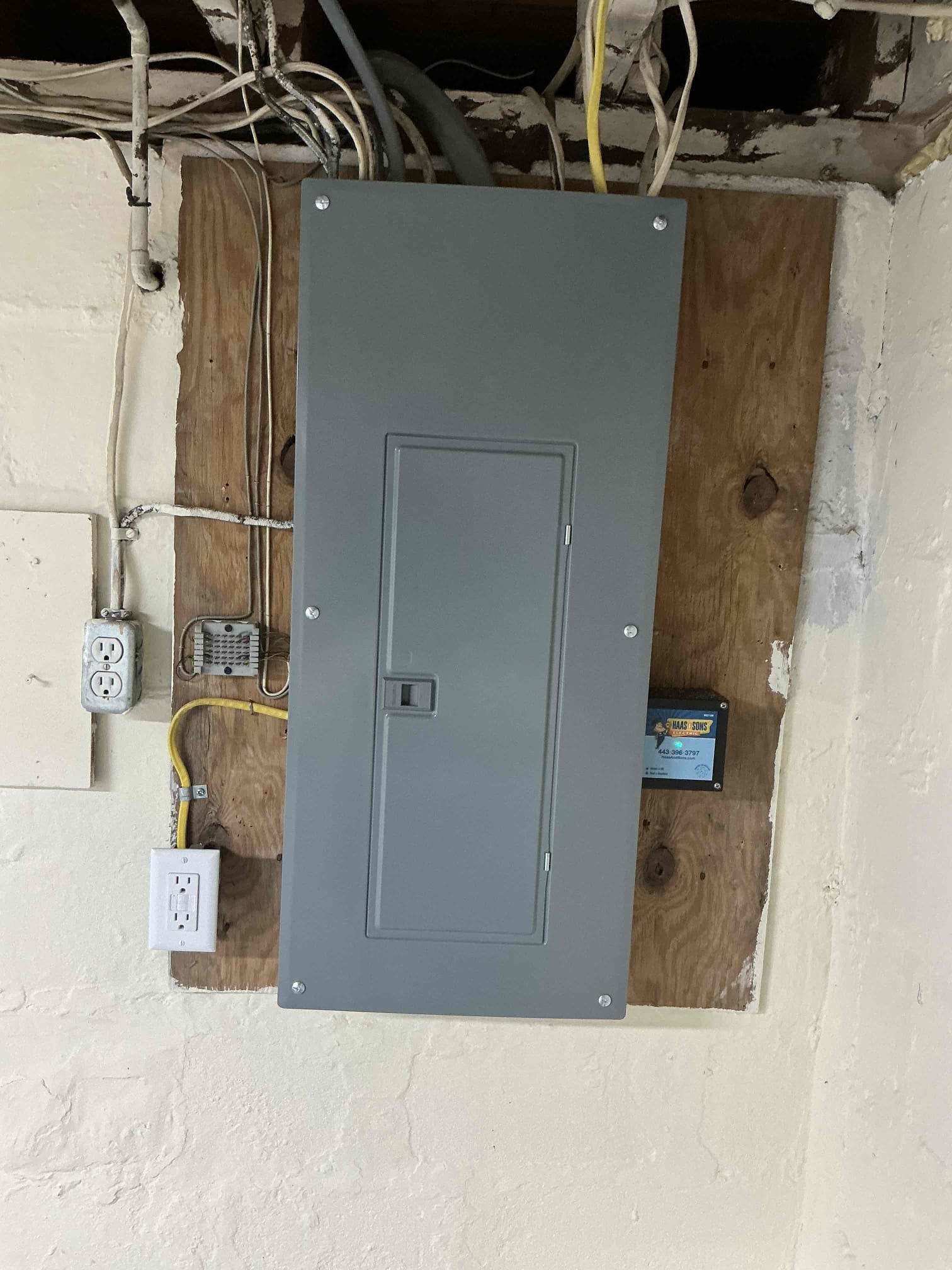 Replace existing 100A overhead service to meet minimum safety standards including: 

200A Main Breaker Panel in place of existing main and sub panel 
200A Service Disconnect 
Weather head and 4/0 Line/Load Service Cable Replacement sized for 200A Service 
All new breakers sized appropriately for circuits they are serving 
Whole Home Surge Protection 
Update Main Ground Electrode System 
Cold water bond at Main water shutoff
Hot/cold water bond at water heater 
Panel GFCI 
Permit and BGE Coordination included 

