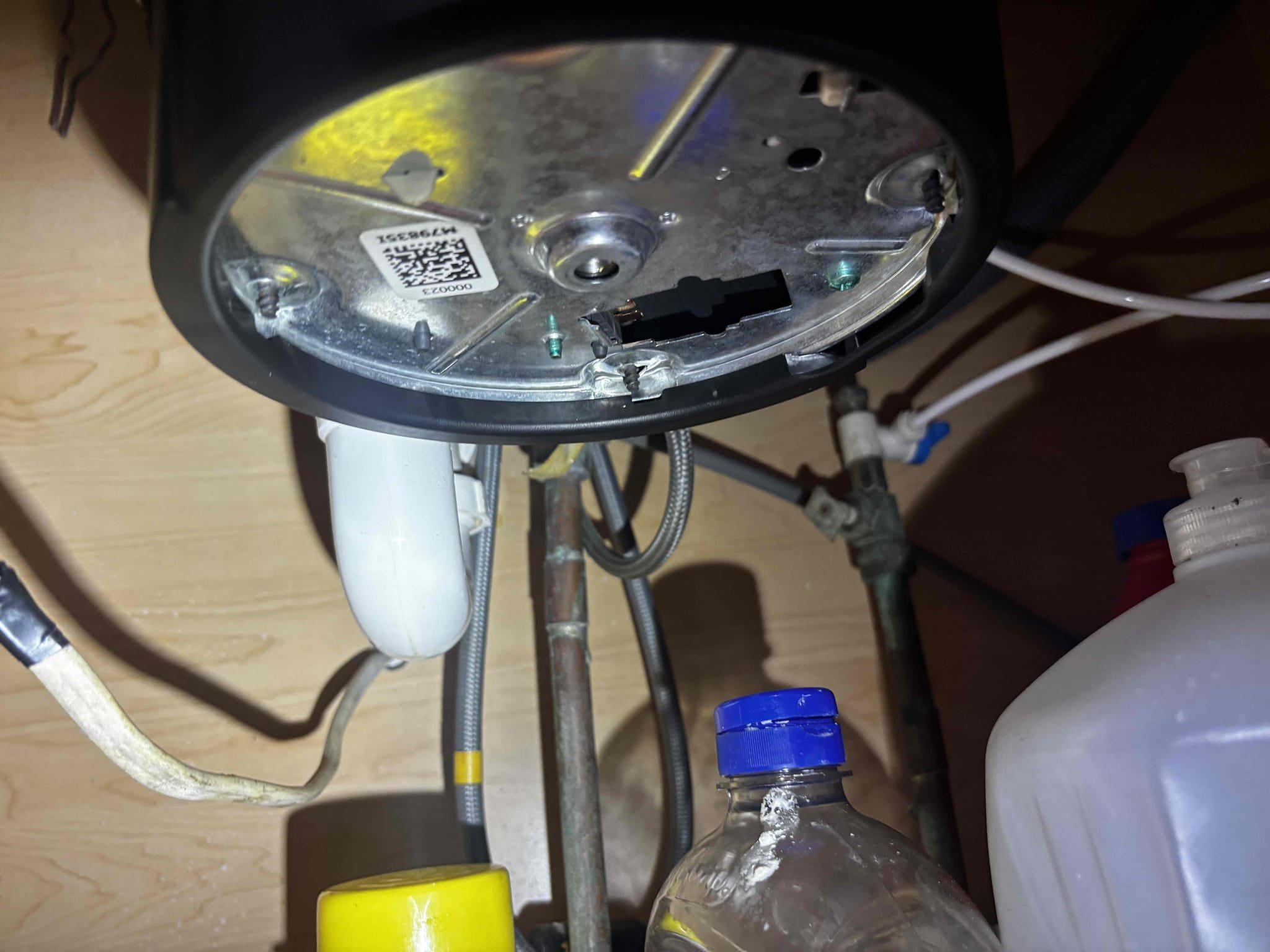 Install outlet for garbage disposal and replace 3 exterior light fixtures with customer supplied new ones