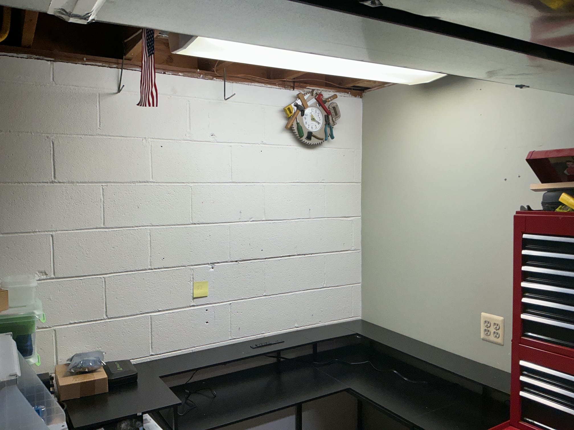 - Installation of 2 - 20 amp circuits connected to the panel, each on its own dedicated circuit
- Installation of 2 - 20 amp GFCI breakers for safety because of the concrete floor
- Installation of 2 quad outlets on 1 circuit
- Installation of 6 quad outlets on the other circuit
- Installation of the wiring, connections and straps

Today’s visit was for a solution to install 5 quad receptacles on 2 different circuits. We completed all of the work today. Both circuits are on a GFCI breaker because of concrete floors. The wires are run in UF and down the walls in pipe to protect from damage. 