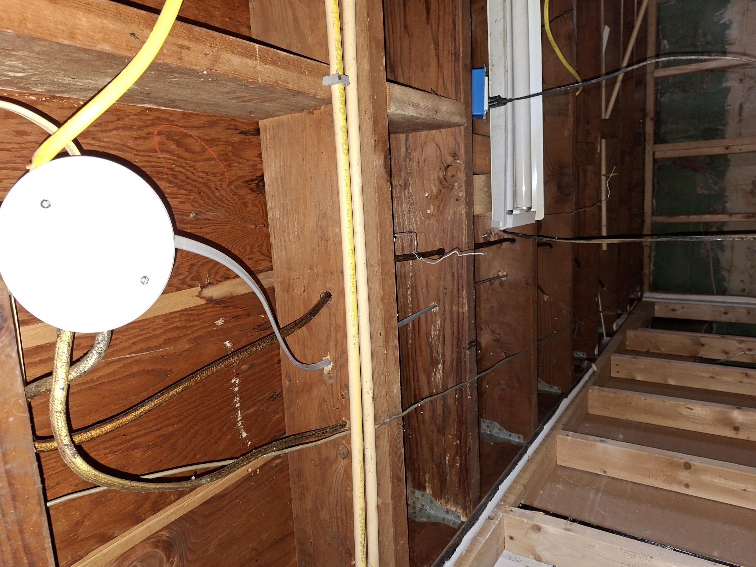 Take power from a junction box located in basement ceiling and run power to a plug behind the stove.

Called out today to install a new receptacle for a gas stove. I saw a junction box in the basement where I would be able to derive power for the new plug. While doing my safety assessment, I came across many serious safety concerns. The panel is a 20 space GE Slimline panel installed in 1994. This panel is of low quality and has brand history of the breakers not tripping properly. In the main electrical panel, I discovered that there was significant corrosion caused by a torn service cable allowing water to enter the panel. I discovered signs of overheating on the hot (black) and neutral (white) wires, seen as crinkling of the wire jackets. I also discovered multiple circuits double tapped on breakers. The dryer is currently double tapped with the subpanel. This can cause overheating. The subpanel grounds and neutrals are not separated, which can cause fault current to not go on the co