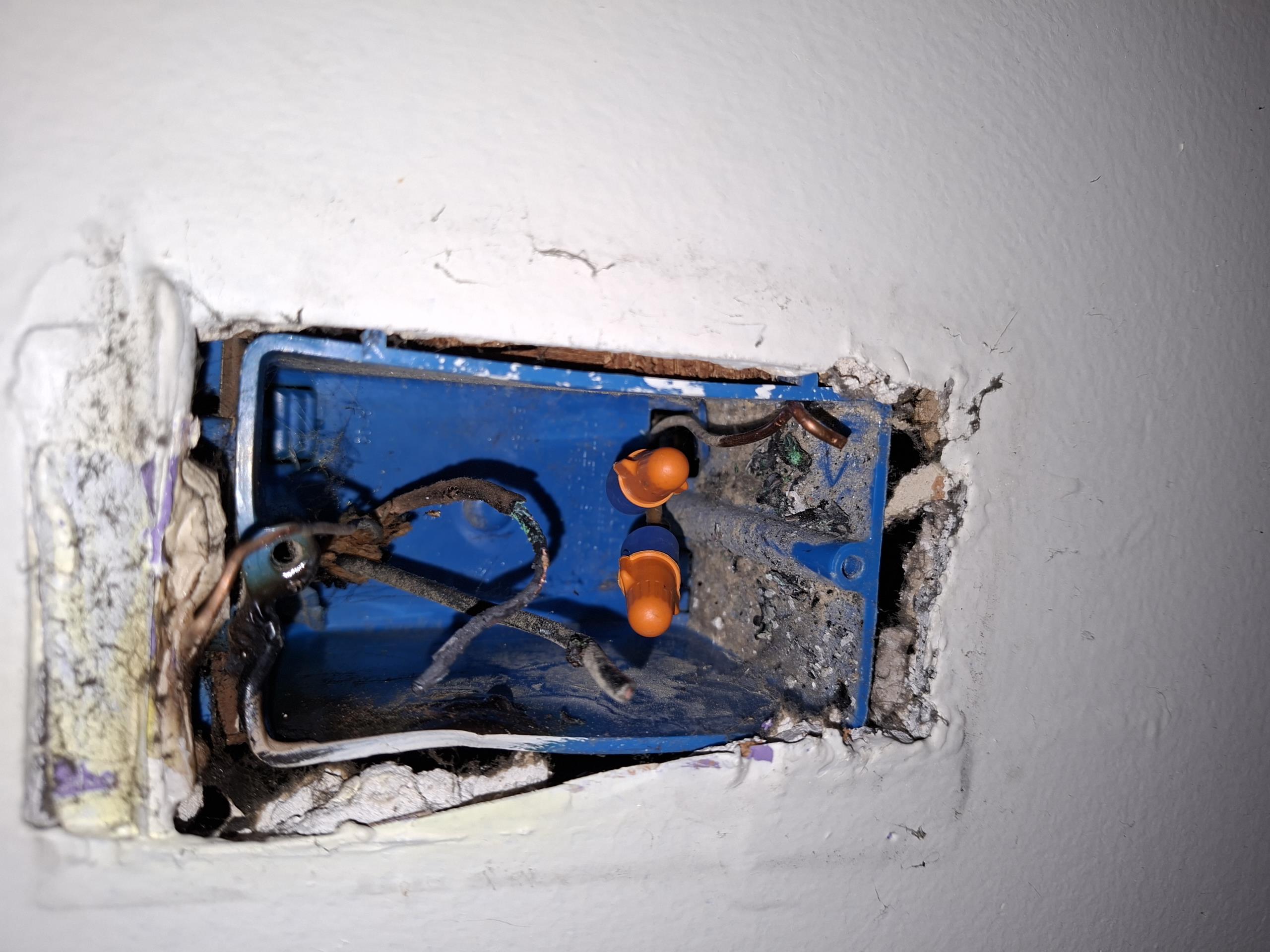 Called out today to investigate two upstairs bedrooms that had lost power. Upon arrival, customer directed me to the left bedroom, where an outlet had developed scorching. A space heater had been plugged in to this receptacle, and upon trying to unplug the record player from the outlet, the cord end broke and one of the prongs of the cord had melted to the device. Opening the device, the top left of the receptacle had completely melted away. Due to potential damage on the rest of the circuit, I recommended redevice the entire upstairs circuit, including the switches. Continuing my safety assessment with the panel, I saw a QO 20 space, 100 amp panel installed in 1973. Due to the age of the panel and signs of corrosion beginning to develop, I recommended a panel replacement. Customer was also interested in installing a dedicated circuit for a space heater in the upstairs bedroom, to prevent future power losses. Continuing my assessment to the outside shed, I discovered that the grounds a