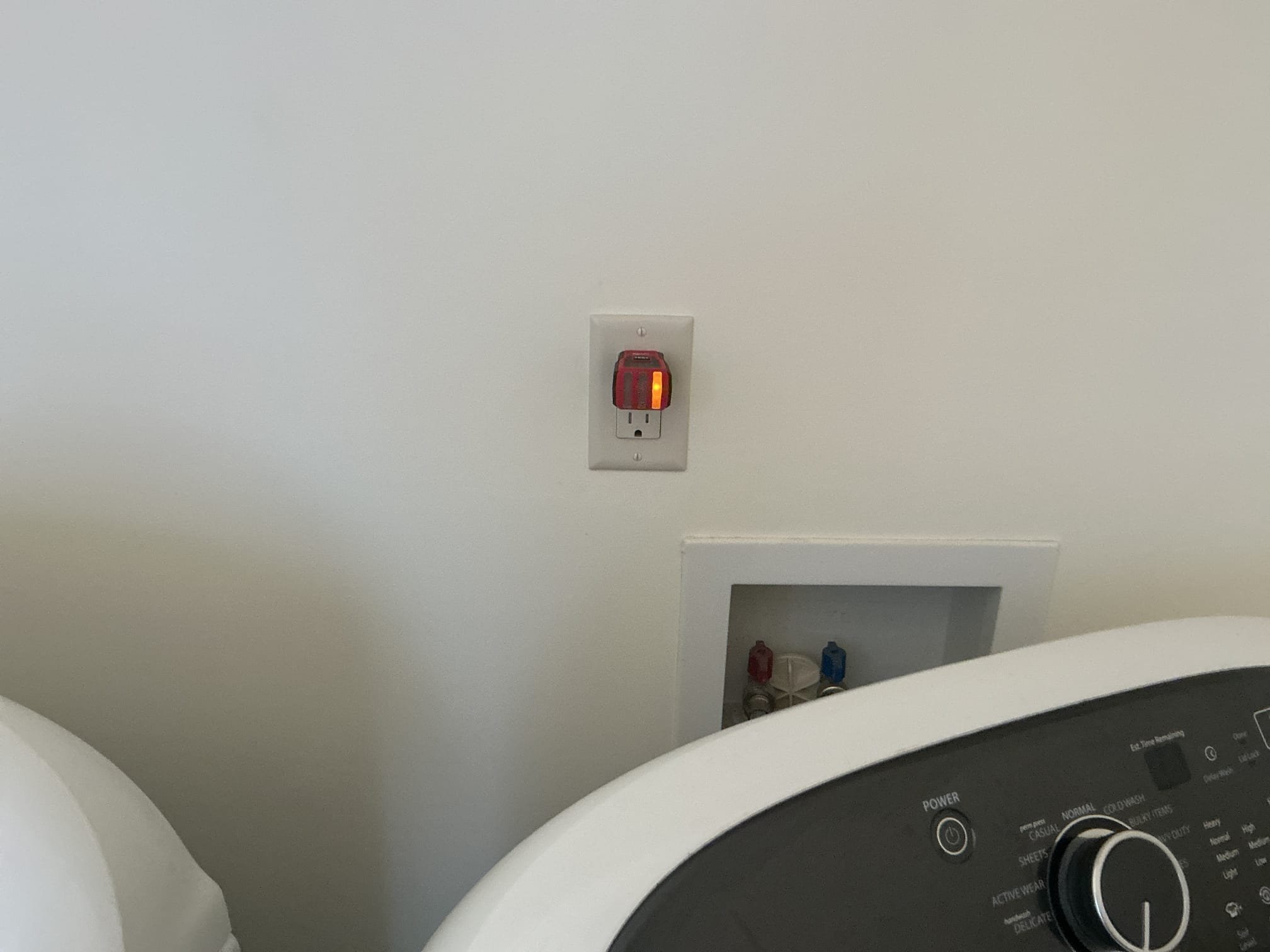 Installation of new exterior GFCI and weather rated cover to replace current non functioning GFCI.

Remove and install GFCI located behind washer (new device) when previously wired, polarity was mixed up. Correctly install hot wire on correct terminal as well as neutral on correct terminal. 