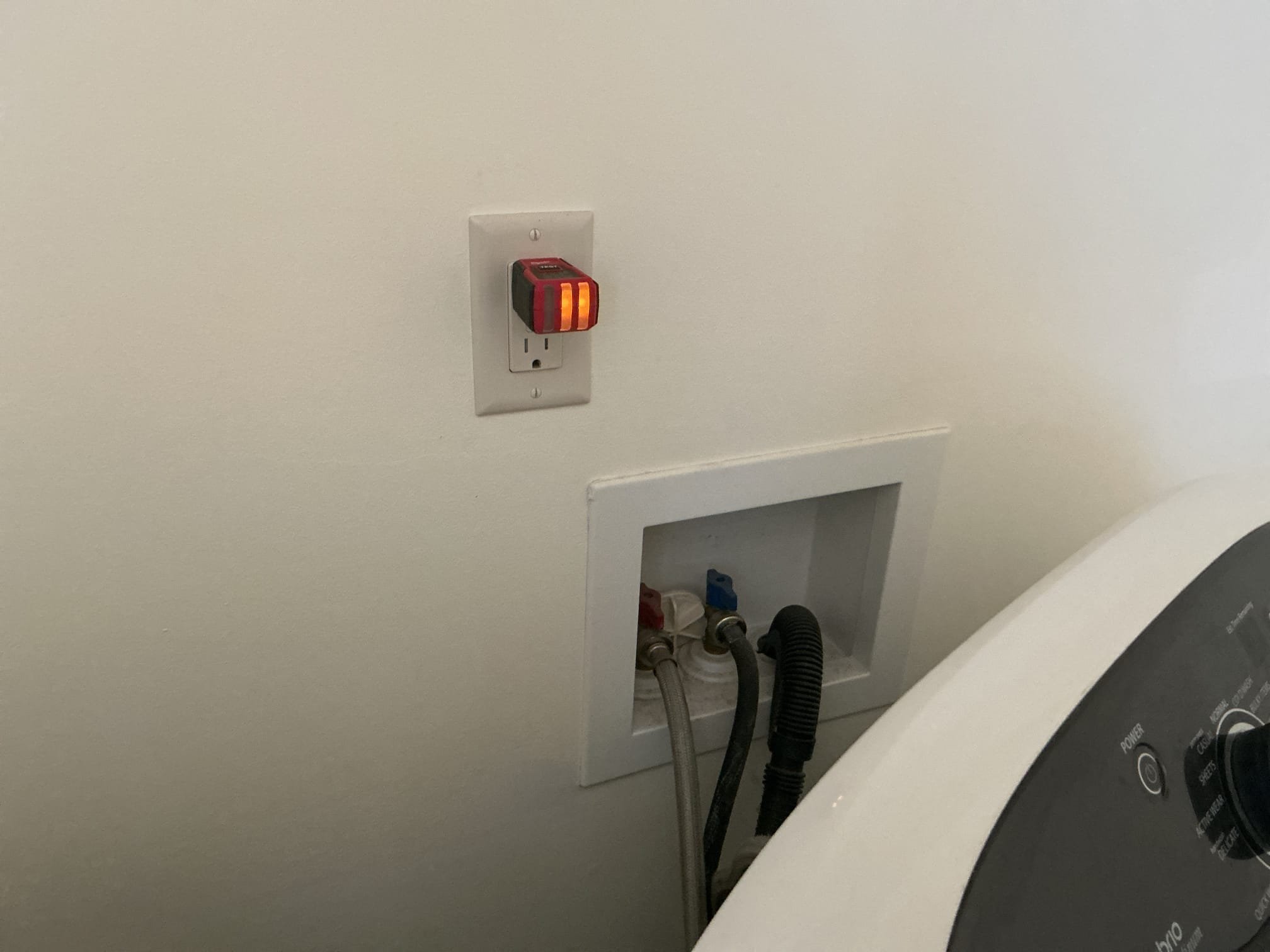 Installation of new exterior GFCI and weather rated cover to replace current non functioning GFCI.

Remove and install GFCI located behind washer (new device) when previously wired, polarity was mixed up. Correctly install hot wire on correct terminal as well as neutral on correct terminal. 