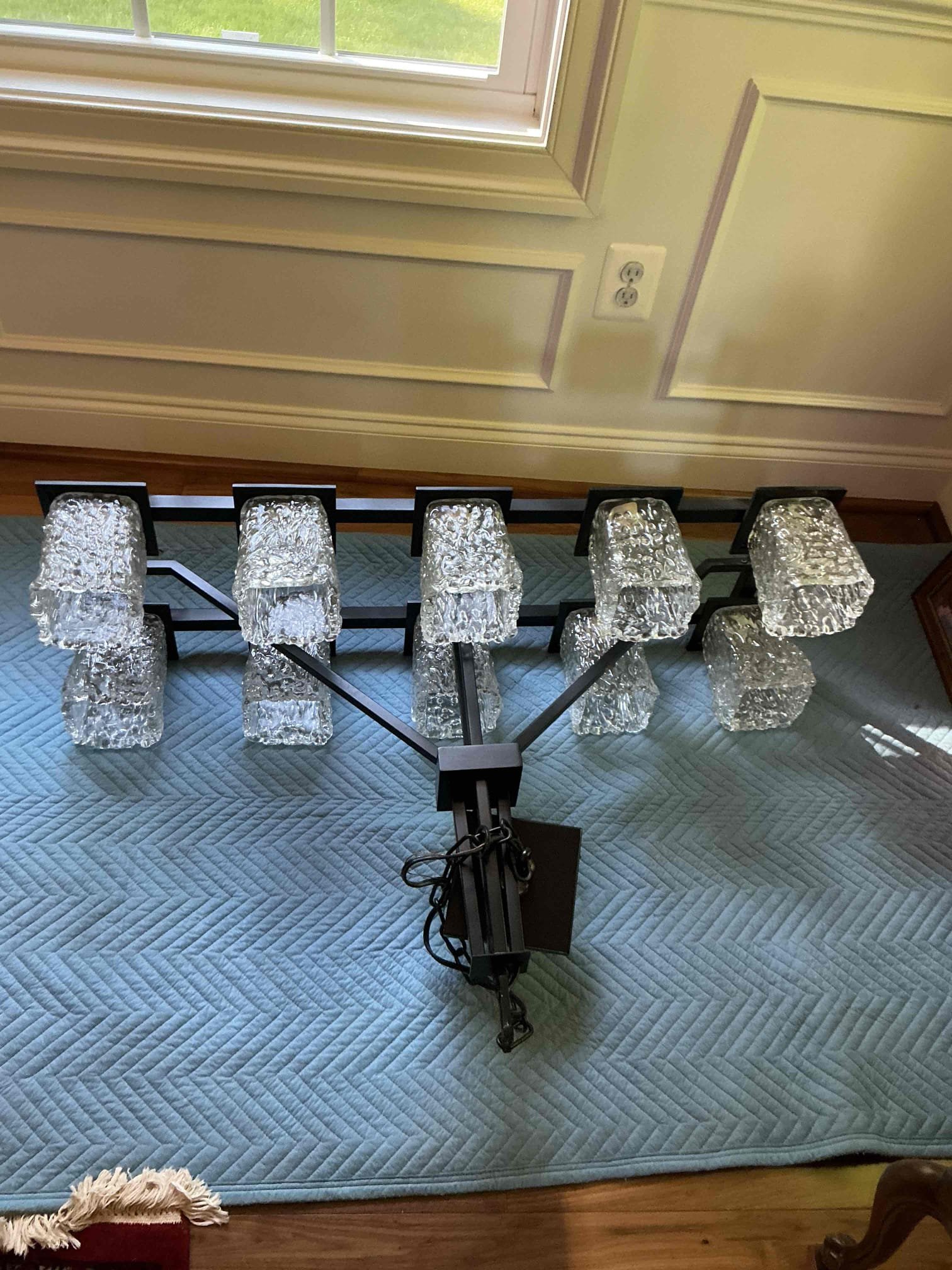 For this job, I came out to provide and estimate for the installation of a heavy chandelier, roughly 80lbs or so on 20’ ceiling. I included the installation of a bar brace box to accommodate the weight of the fixture. Additionally, upon looking in the main electrical panels for a complimentary safety check-up, I observed the lack of surge protection in the panel, which protects anything in the home from potential damage from a power surge including kitchen appliances, EV chargers, TVs , computers, lighting, etc. and is required to meet today’s minimum safety standards. 