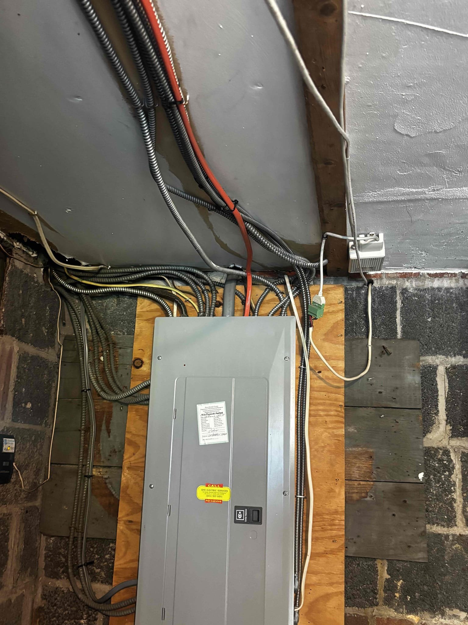 Replace 10/3 nm cable providing power to the A/C unit. We will re route the new circuit to avoid the garage door opener. The current cable runs on top of the garage door opener and everytime the door opens it makes contact with the cable causing more damage. Additionally we will replace the current 40 amp circuit breaker providing overcurrent protection to the A/C unit to ensure that all elements of the circuit are working correctly.
