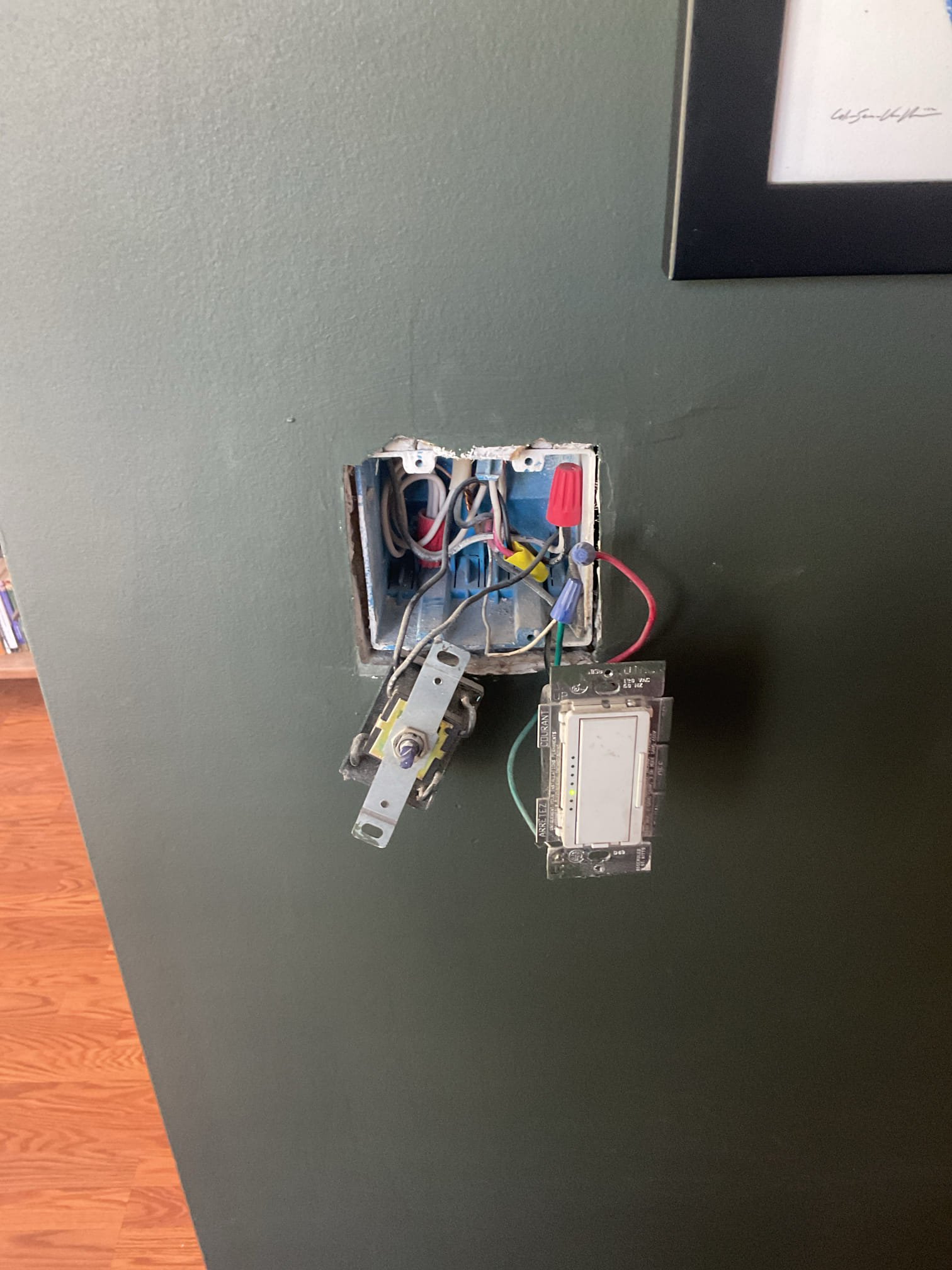 Today’s visit was to take a look at a damaged fan control switch & dimmer switch that controlled a ceiling fan in the office/den area. When I arrived, I met with Ben’s parents who were assisting with the visit while he is out of town. I was shown to the problem switches where I saw that the switches were not very secure and they were starting to come apart when removed from the wall. This was the only thing that they wanted me to look at today, so I created solutions for the replacement of both switches. I only had a dual fan/light control on the van with me to use as the fan control switch replacement, but they were ok with me using that switch and leaving the light portion to be controlled by the second dimmer switch. Today, I replaced both switches, and the light/fan are working properly again. 

- removal and replacement of damaged fan control switch
- removal and replacement of damaged dimmer switch