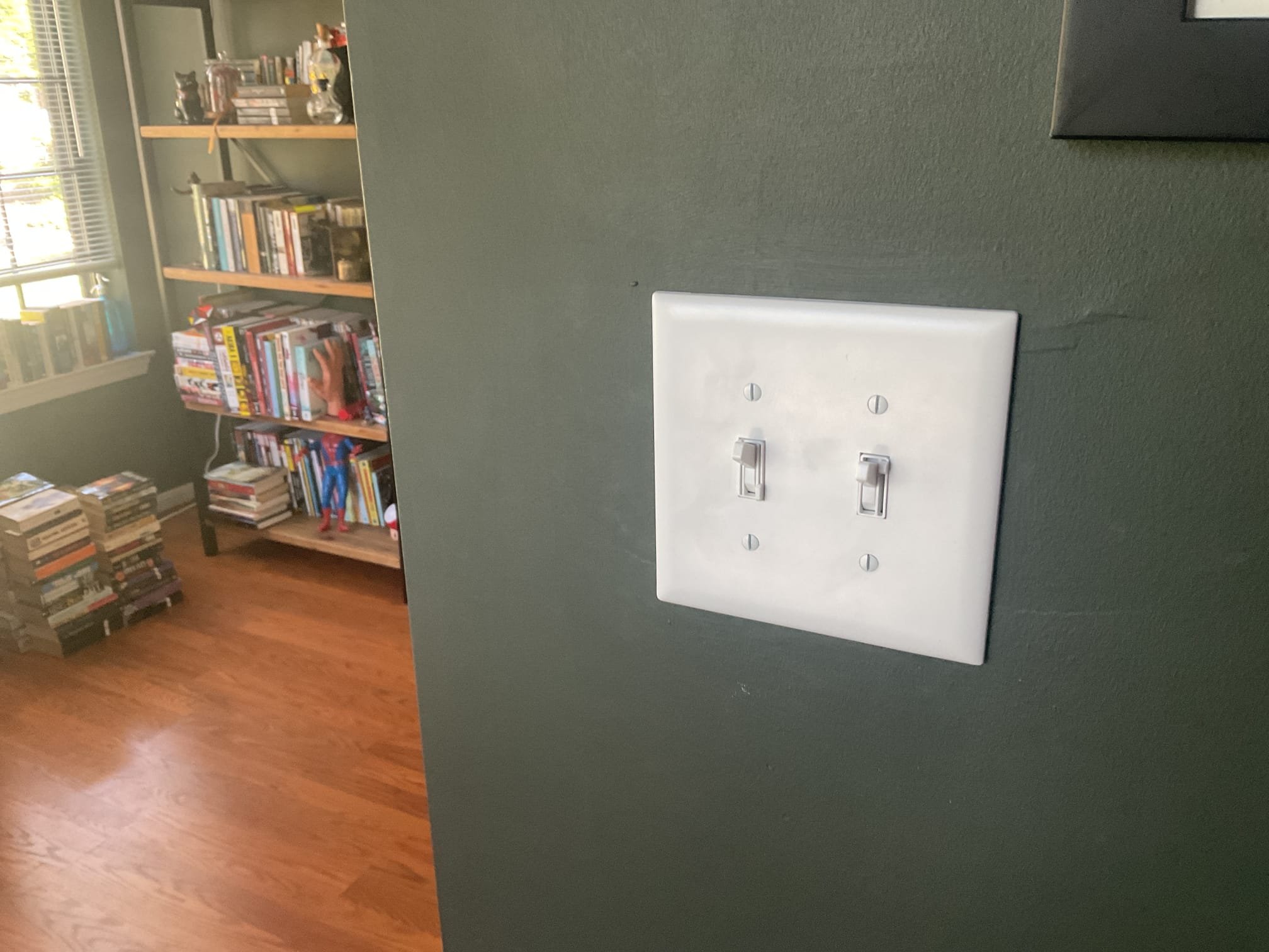 Today’s visit was to take a look at a damaged fan control switch & dimmer switch that controlled a ceiling fan in the office/den area. When I arrived, I met with Ben’s parents who were assisting with the visit while he is out of town. I was shown to the problem switches where I saw that the switches were not very secure and they were starting to come apart when removed from the wall. This was the only thing that they wanted me to look at today, so I created solutions for the replacement of both switches. I only had a dual fan/light control on the van with me to use as the fan control switch replacement, but they were ok with me using that switch and leaving the light portion to be controlled by the second dimmer switch. Today, I replaced both switches, and the light/fan are working properly again. 

- removal and replacement of damaged fan control switch
- removal and replacement of damaged dimmer switch