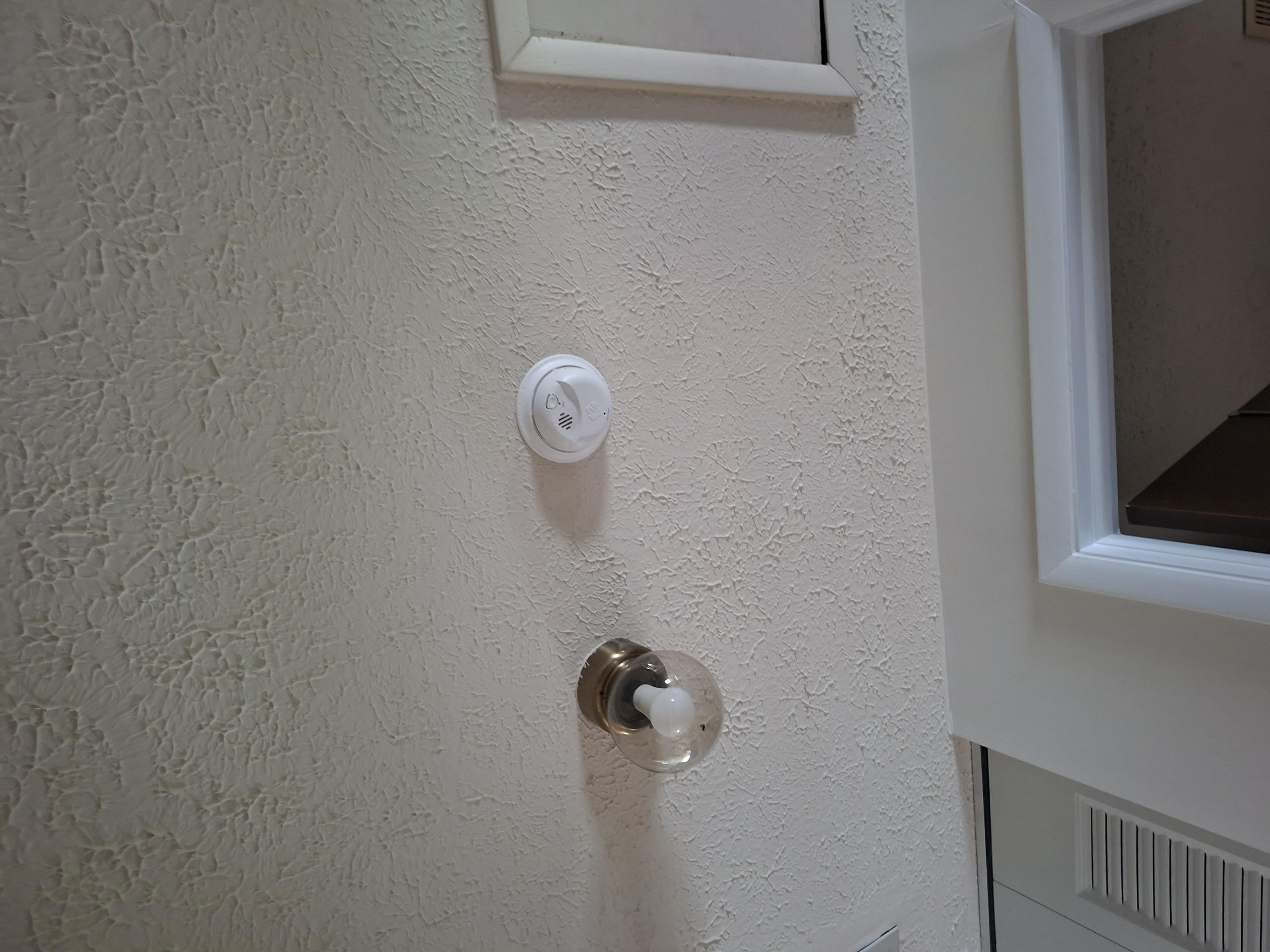 Install 3 company supplied smoke detectors and install 2 new detectors in each bedroom,  running wire from current box in upstairs hallway. Add bonding wire between hot and cold water pipes for water heater.

Called out today to investigate installing new smoke detectors on each floor, and adding a smoke detector in each bedroom. Performing my performance and safety assessment, I discovered that the water heater did not have the proper bonding between the hot and cold water pipes. I also saw that the panel did not have whole home surge protection. I gave a solution to replace and add additional smoke detectors, add a bonding wire, and install a whole home surge protector. Customer went with the “Replace” option. 