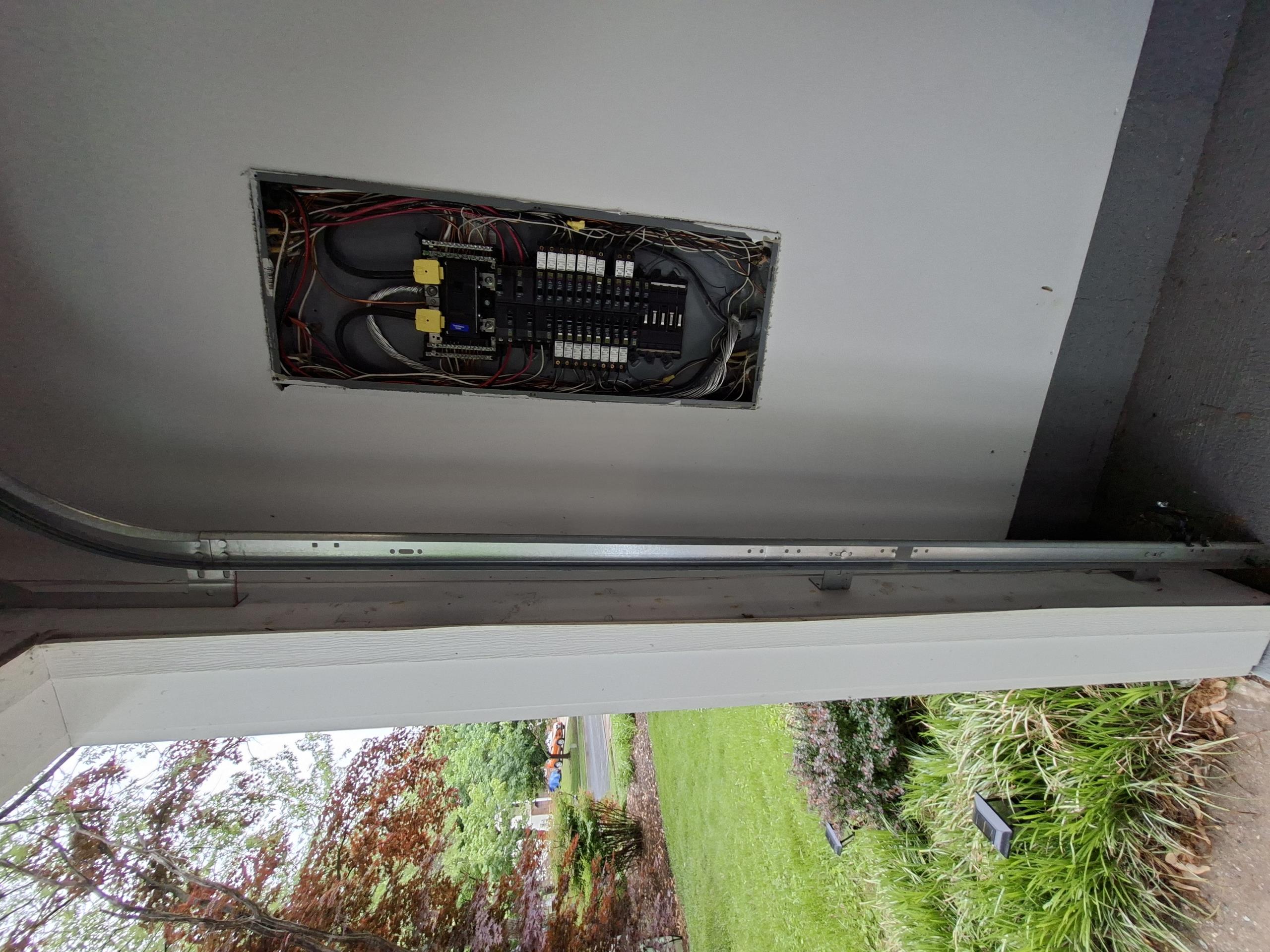 Called out today to provide solutions to install a customer supplied car charger outside. Panel is in the garage, adjacent to where the charger would be installed. I did a load calculation and confirmed that the panel would be able to handle the additional load. I also gave a solution to install a whole home surge protector inside the panel as well. We would run a 60 amp circuit to the charger, with some drywall damage having to be done to run the wire. The circuit would then be terminated on the correct 60 amp breaker.