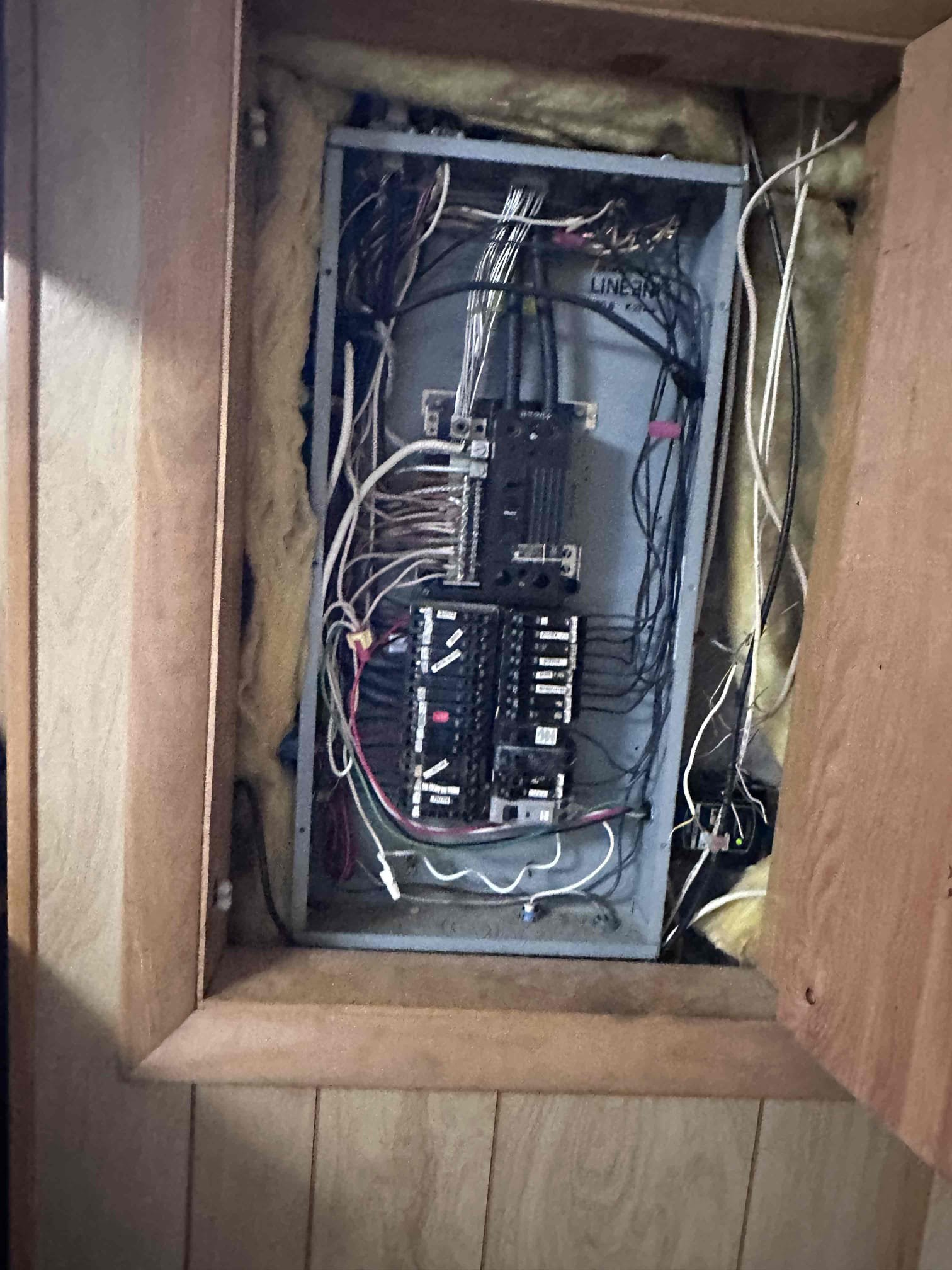 This solution is only if splitting the small appliances between the 2 kitchen circuits, by plugging in the air fryer or electric skillet to one of the receptacles on the right side of the sink does not fix the tripping breakersInstallation of the breaker, GFCI receptacle, outlet box, and wiring
 Running the new wiring would go through the drop ceiling in the basement over to under the kitchen, then drill up to the new receptacle for a dedicated circuit

-Today’s visit included diagnosing a tripping/overloaded circuit in the kitchen. Customer previously had electricians out to quote said work today. While in the home accessing, we saw the customer was overloading one circuit in the kitchen vs utilizing both kitchen counter top circuits. We recommended on splitting up the appliances to share the load due to another circuit being available. The panel/service cable were dated however, it would not solve the issue of the overloaded circuit. Today we included a quote to add an additional cir