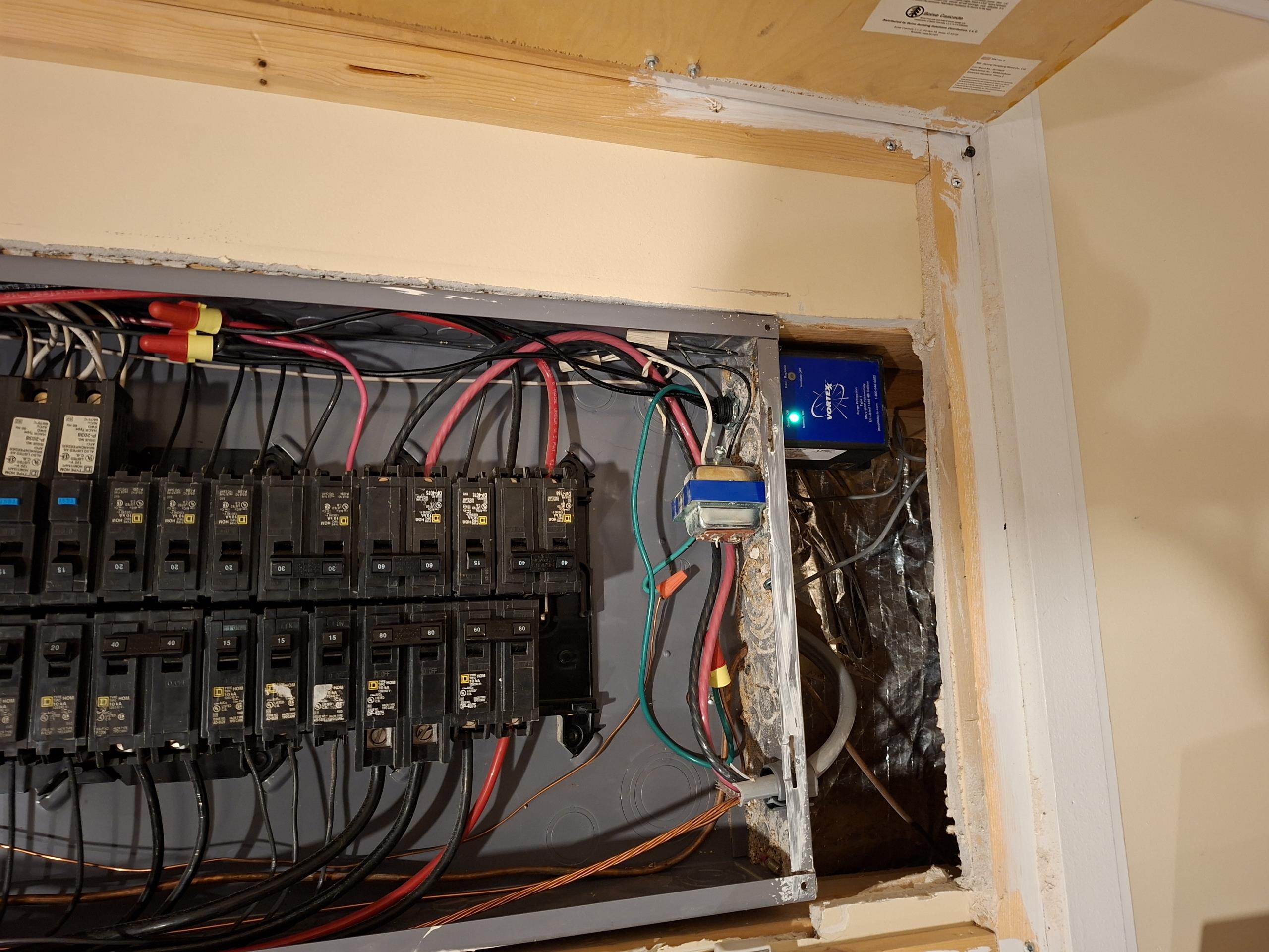 Replace two GFCIs on 20 amp receptacle circuit for general power near pool. Install PSP Products surge protector in main electrical panel. Surge protector features a lifetime warranty, and $50,000 of combined protection offered by PSP Products. Includes Haas and Sons VIP Membership.

Called out today to investigate an outside receptacle by the hot tub that was not working. Using my plug tester, I found that both receptacles were off. The breaker feeding these outlets had been turned off. Turning the breaker back on, I retested for voltage, and found a receptacle that was reading 30 volts, and one that was reading the correct 120 volts.
Opening up the 30v receptacle, I tested the lines, and got 120 volts from neutral and ground from the hot wire. This told me the device had failed. Due to the same device being used at the other receptacle, I recommended replacing both devices. Continuing with my safety assessment, I went down to the main electrical panel. There, I saw that there was no 