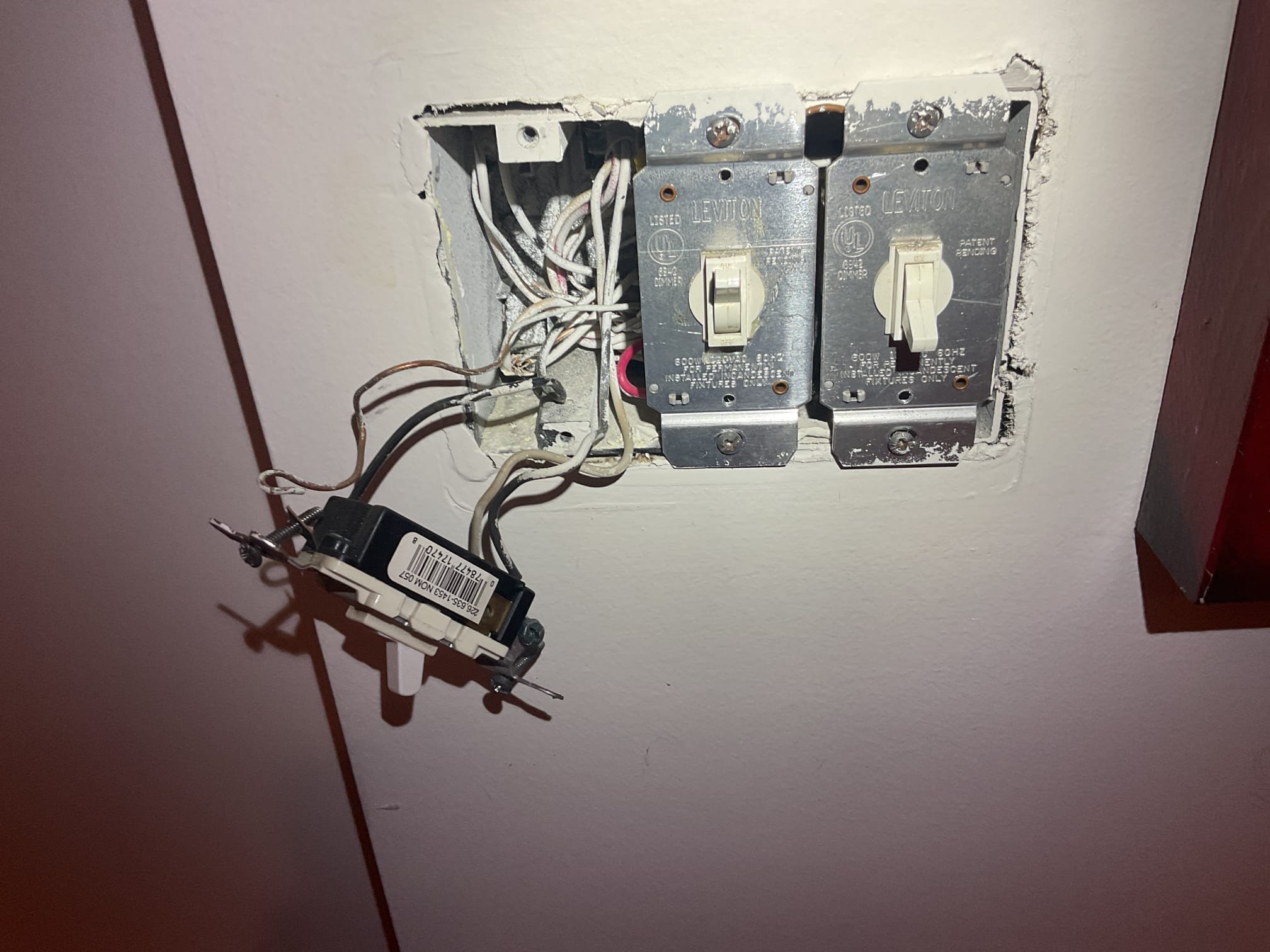 The reason for today’s visit was to take a look at a stairwell light fixture that was not working properly. When I arrived, I met with Ms. Connie who showed me the switches that controlled the basement stairwell light. I started the troubleshoot by opening up the two 3-way switches that controlled the light going down to the basement. I noticed that the switches looked relatively original to the home (1998) and were wired using the backstab method, which can cause device failure faster than using the device screws. One of the 3-way switches was starting to crack apart and was failing due to age/heat damage. Once I bypassed the switch, the light started working again. I also took a look at a switchbank in the master bedroom that she was having issues with after installing a new Decora-style dimmer herself. There were several switches in that switchbank that were backstabbed as well and seemed to be in poor condition, so I offered to not only replace those as well, but to also go around 