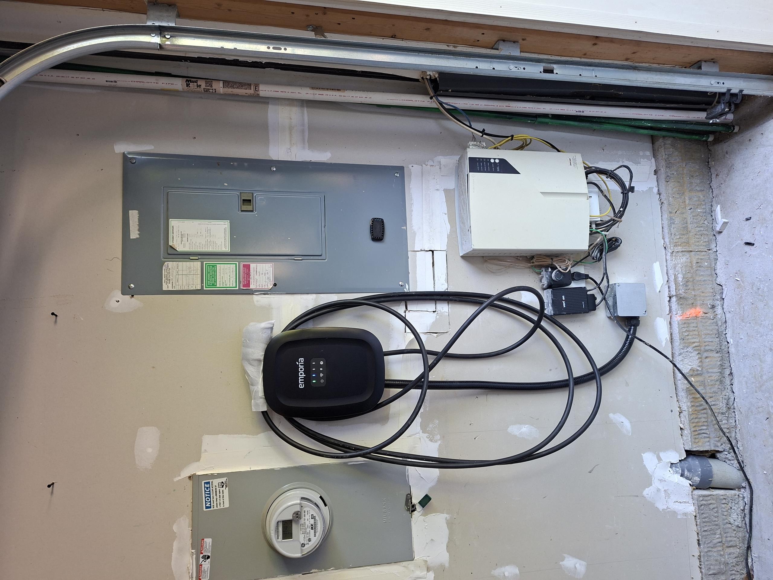 Install a customer supplied hardwired car charger and run a 60 amp circuit from panel to the charger.