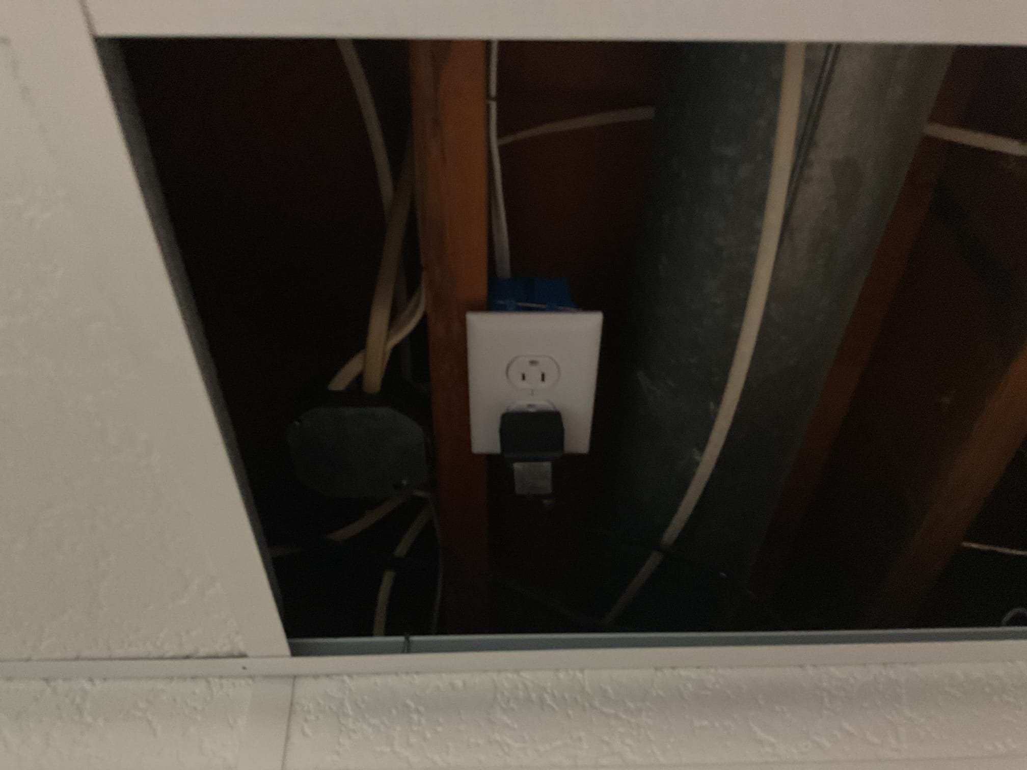 Today’s visit was to take a look at an intermittent power loss in the laundry room. The circuit was tripping the breaker during the wash cycle. When we arrived, we met with Ms. Lisa, who showed us to the laundry room. We had completed a whole-home alumiconn redevice in 2022, however, the washer receptacle was missed during that process. We replaced the receptacle with an appropriate GFCI and alumiconn connectors. During our investigation, we did find an extension cord plugged into the affected circuit that was spliced above the drop ceiling, so we provided a solution today to replace the extension cord with a proper receptacle in the drop ceiling to safely provide power to the coax booster that was plugged in. We completed the new receptacle installation, and informed Ms. Lisa of the repair to the washer receptacle as well. We also made her aware of the fact that the only additional solution to the washer tripping past this point would be to run a proper dedicated circuit out to the wa