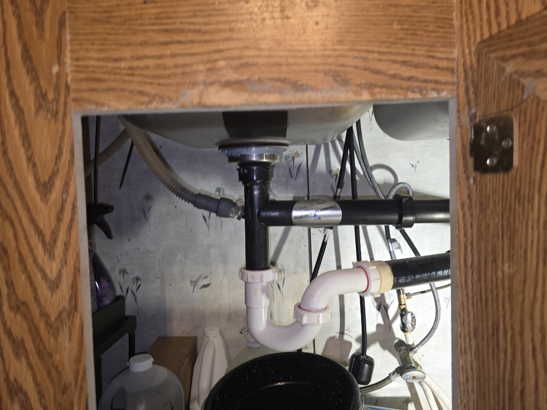 plumber needed 

cant get the water to drain we can if we cant do it no one can 